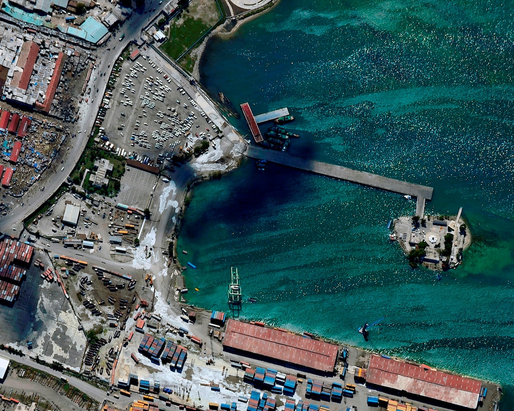 An aerial view of Port-au-Prince harbor in Haiti from an OC-135B Observation Aircraft Jan. 14. The OC-135B flew over Haiti for over three hours taking panoramic photos to help coordinate U.S. military support to the Haiti relief effort. (U.S. Air Force photo by Airman 1st Class Perry Aston) 
