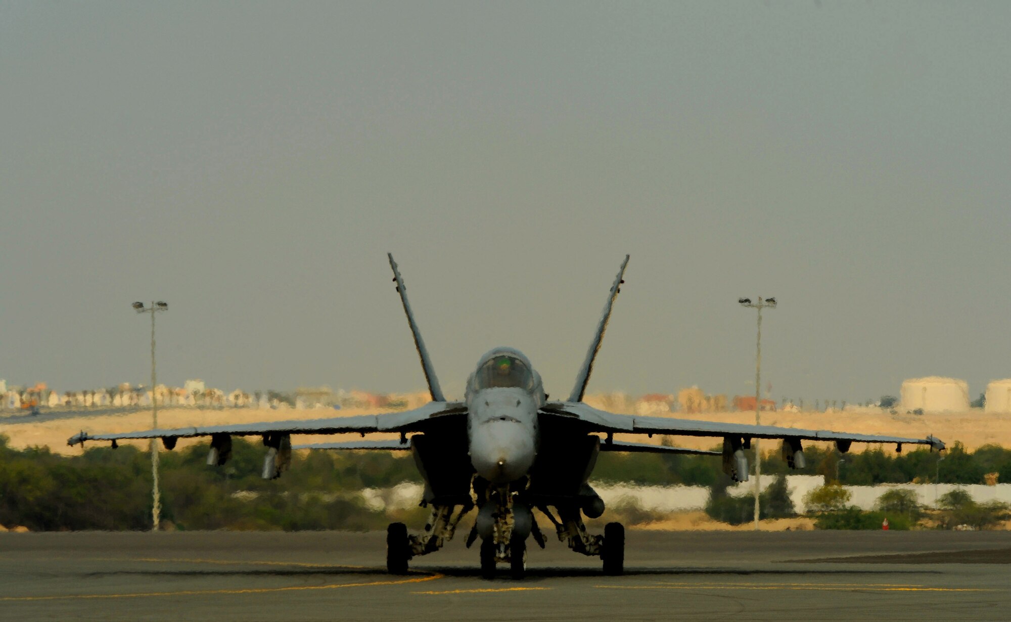 A U.S. Navy F-18E/F Super Hornet aircrew taxis during the Bahrain International Airshow Jan. 20, 2010.   (U.S. Air Force photo/ Staff Sgt. Angelita Lawrence/released)