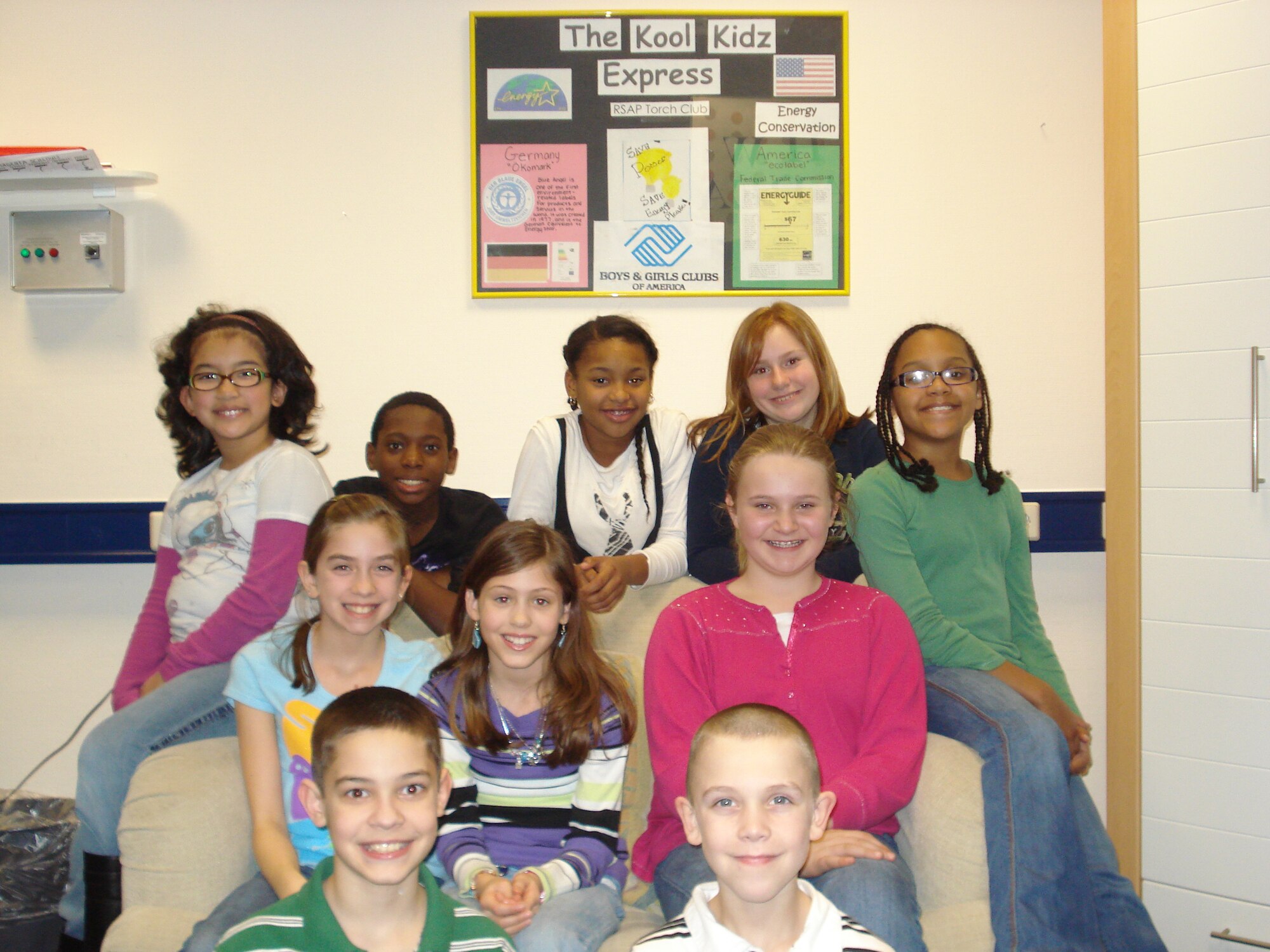 Members of the Ramstein Kool Kidz Express Torch Club pose for a photo. The club is a character and leadership program for Boys and Girls Club members ages 10 to 12. (Photo by Angela Mackin)
