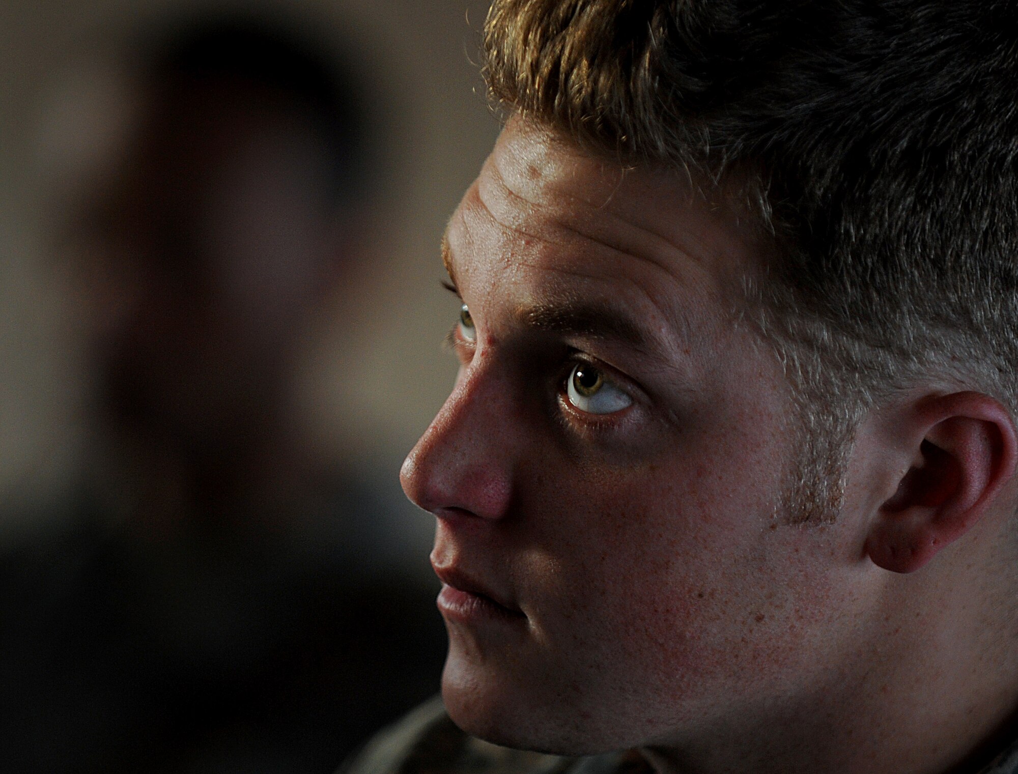 MOODY AIR FORCE BASE, Ga. -- Airman Robert Tagley, 823rd Security Forces Squadron member, listens to instructions before processing the deployment line here Jan. 20. The 823rd SFS is deploying to Haiti to augment security forces already present at the Toussaint Louverture International Airport in Haiti’s capital, Port-au-Prince. (U.S. Air Force photo by Senior Airman Gina Chiaverotti-Paige)