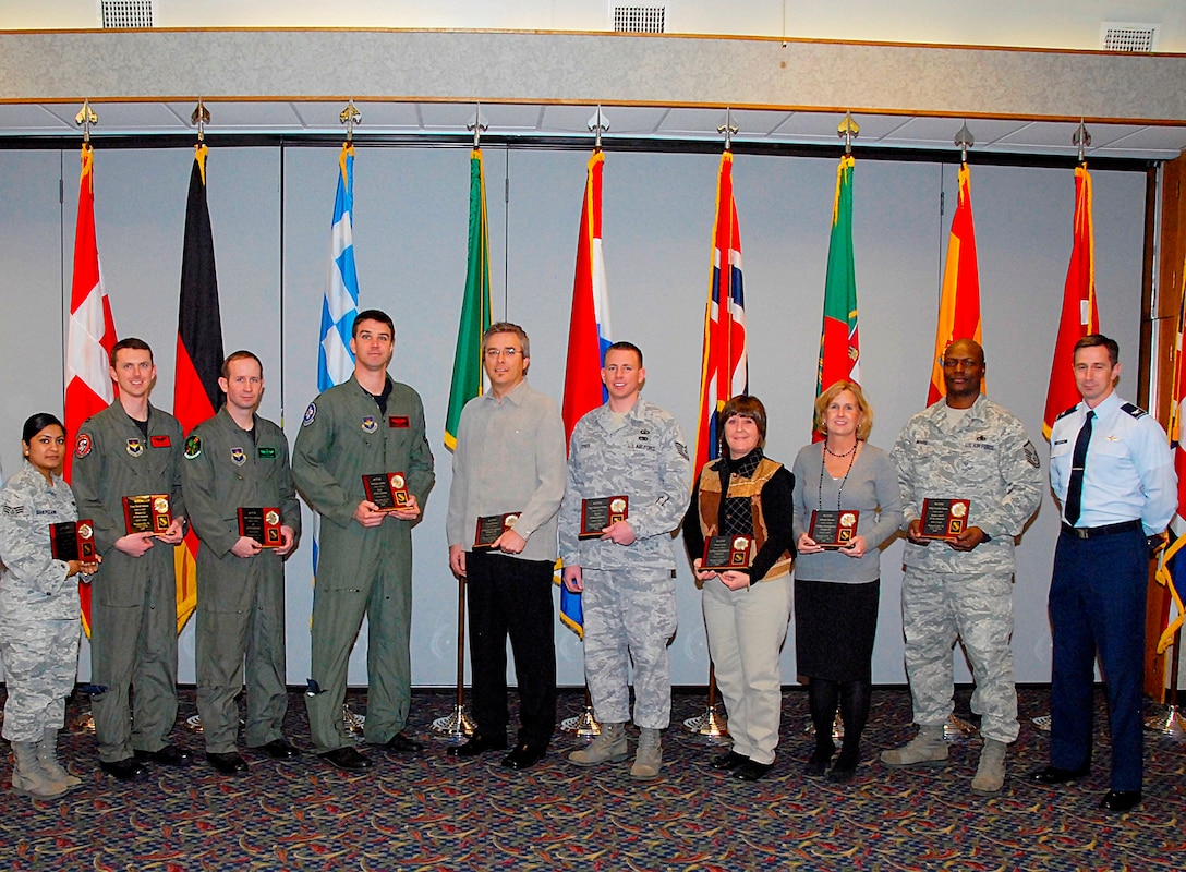 The 80th Flying Training Wing recognizes their Quarterly Award Winners Jan. 20 by having Col. Kevin Schneider, 80th FTW commander (far right), present plaques to them. From left to right, Senior Airman Sumera Shehzadi, 469th Flying Training Squadron; Capt. David Isaksen, 89th FTS; Maj. Chad Hillberg, 459th FTS; Maj. Jason Earley, 88th Fighter Training Squadron; David Bowles, 80th Operations Support Squadron; Tech. Sgt. Clinton Dykes, 80th OSS; Diane Silver, 80th OSS; Michele Houck, 82nd Contracting Squadron; and Master Sgt. Frankie Moore, 80th FTW. Not pictured is Capt. William Johnson from the 80th Operations Group. (U.S. Air Force photo/ Harry Tonemah)
