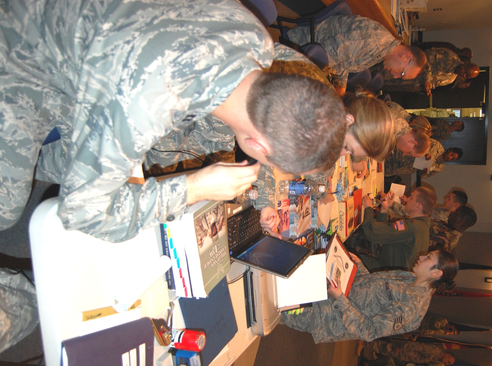 Medics proceed through the deployment processing line Jan. 19 as they prepare for deployment in support of Operation Unified Response (Haiti).    (U.S. Air Force photo by Steve Pivnick)