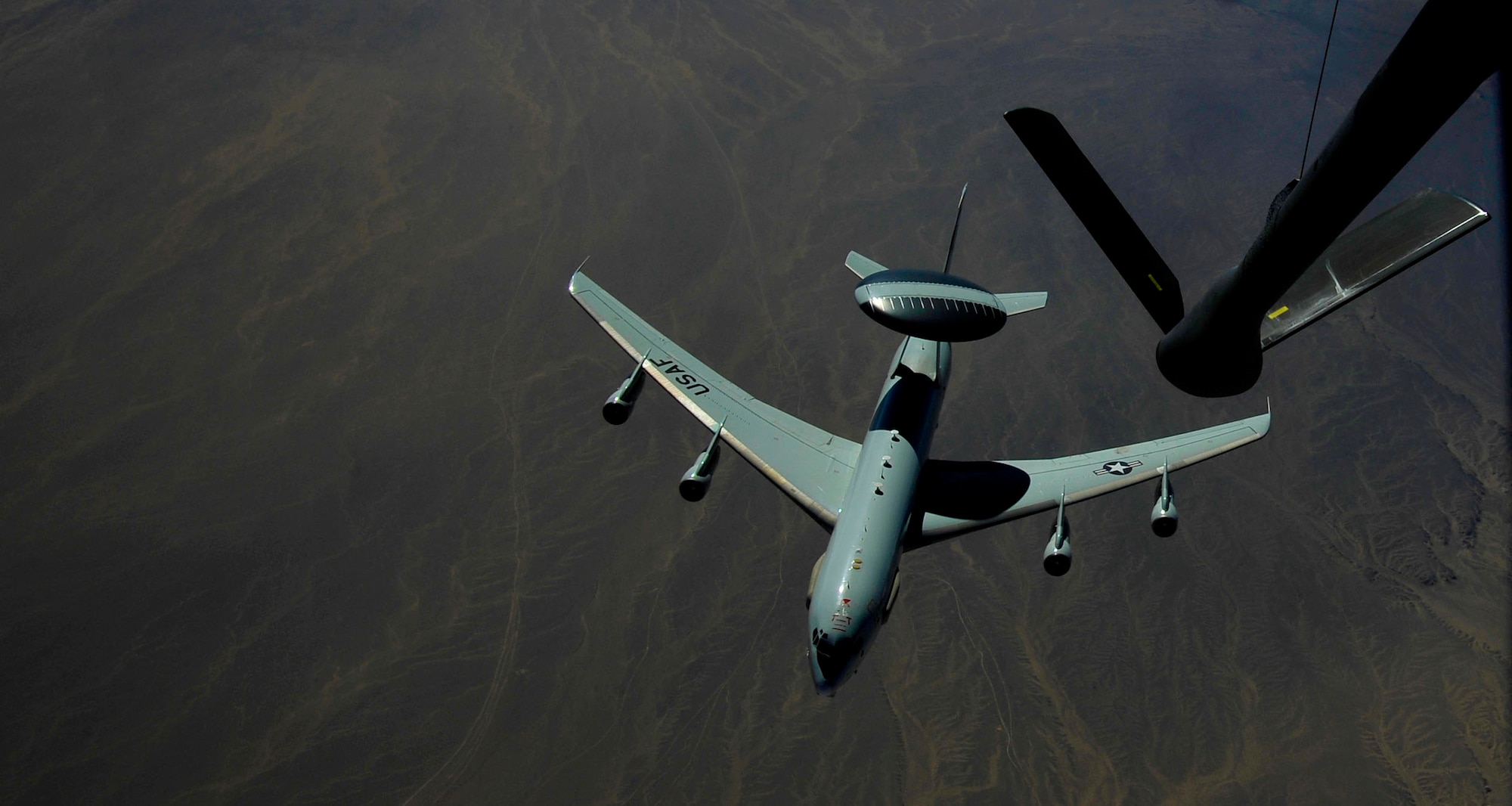 U.S. Air Force Airmen from the 340th Expeditionary Air Refueling Squadron,  refuel an E-3 Sentry, Airborne Warning and Control System (AWACS) aircraft, Jan.15, 2010, over Afghanistan.  The AWACS is an airborne radar system designed to detect and manage aircraft.  The E-3 is used at high altitudes and can distinguish between friendly and hostile aircraft from hundreds miles away. (U.S. Air Force photo/ SSgt Angelita Lawrence/released)