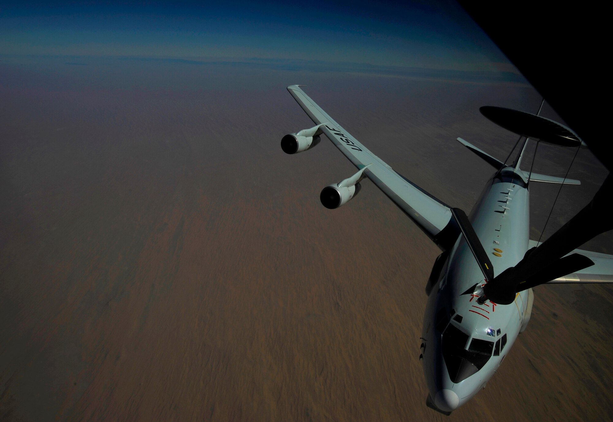 U.S. Air Force Airmen from the 340th Expeditionary Air Refueling Squadron,  refuel an E-3 Sentry, Airborne Warning and Control System (AWACS) aircraft, Jan.15, 2010, over Afghanistan.  The AWACS is an airborne radar system designed to detect and manage aircraft.  The E-3 is used at high altitude and can distinguish between friendly and hostile aircraft from hundreds of miles away. (U.S. Air Force photo/ SSgt Angelita Lawrence/released)