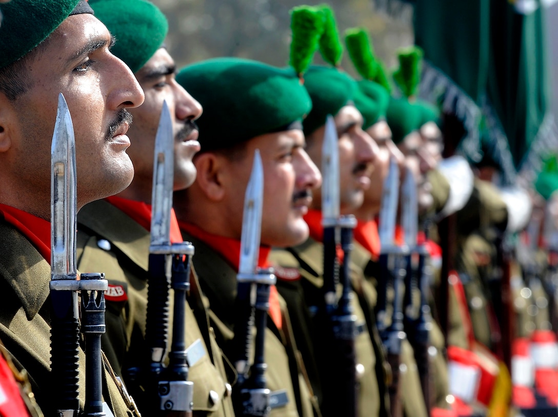 A Pakistani Honor Guard prepares for the arrival of U.S. Defense Secretary Robert M. Gates at the Army's Martyr's Monument that honors the sacrifices of security forces and citizens in their fight against extremists in Rawalpindi, Pakistan, Jan. 21, 2010.