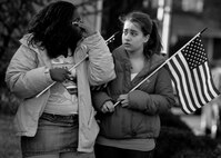 WESTWOOD, N.J. - People line the street to honor a local Marine killed in Afghanistan, Jan. 21. The body of Sgt. Christopher R. Hrbek, 25, a Westwood, N.J., native, was escorted from Dover Air Force Base, Del., past streets lined with people waving American Flags to Beckers Funeral Home. Hrbek, a field artillery cannoneer with 3rd Battalion, 10th Marine Regiment, Regimental Combat Team 7, II Marine Expeditionary Force, died Jan. 14 while conducting combat operations in Helmand Province, Afghanistan. The Bronze Star Medal with combat distinguishing device is scheduled to be presented to his family at his funeral, Jan. 23.  The medal was approved for saving the life of his battalion sergeant major after an improvised explosive device severed both his legs during a firefight, Dec. 23, 2009. (Official Marine Corps photo by Sgt. Randall A. Clinton)