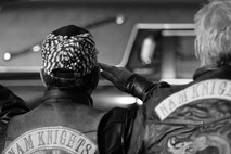 WESTWOOD, N.J. - Members of the Nam Knights Motorcycle Club salute the hearse carrying the body of Sgt. Christopher R. Hrbek, 25, a Westwood, N.J., native, as he was taken from Dover Air Force Base, Del., past streets lined with people waving American Flags to Beckers Funeral Home, Jan. 21. Hrbek, a field artillery cannoneer with 3rd Battalion, 10th Marine Regiment, Regimental Combat Team 7, II Marine Expeditionary Force, died Jan. 14 while conducting combat operations in Helmand Province, Afghanistan. The Bronze Star Medal with combat distinguishing device is scheduled to be presented to his family at his funeral, Jan. 23.  The medal was approved for saving the life of his battalion sergeant major after an improvised explosive device severed both his legs during a firefight, Dec. 23, 2009. (Official Marine Corps photo by Sgt. Randall A. Clinton)