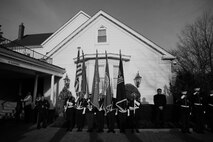 WESTWOOD, N.J. - A color guard stands outside the Beckers Funeral Home as the body of Sgt. Christopher R. Hrbek, 25, a Westwood, N.J., native, is taken inside Jan. 21. He was escorted from Dover Air Force Base, Del., past streets lined with people waving American Flags here. Hrbek, a field artillery cannoneer with 3rd Battalion, 10th Marine Regiment, Regimental Combat Team 7, II Marine Expeditionary Force, died Jan. 14 while conducting combat operations in Helmand Province, Afghanistan. The Bronze Star Medal with combat distinguishing device is scheduled to be presented to his family at his funeral, Jan. 23.  The medal was approved for saving the life of his battalion sergeant major after an improvised explosive device severed both his legs during a firefight, Dec. 23, 2009. (Official Marine Corps photo by Sgt. Randall A. Clinton)