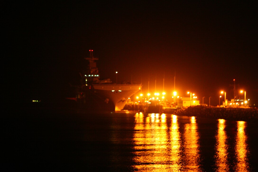 The forward-deployed amphibious assault ship USS Essex (LHD 2) docks, Jan. 22. More than 170 vehicles and 450 tons of equipment from the 31st Marine Expeditionary Unit (MEU) were embarked aboard the forward-deployed Essex Amphibious Ready Group (ARG) in support of the Spring Patrol. The MEU’s first scheduled exercise is Cobra Gold 2010 (CG’ 10).  CG’ 10 is the latest in a continuing series of exercises designed to promote regional peace and security.