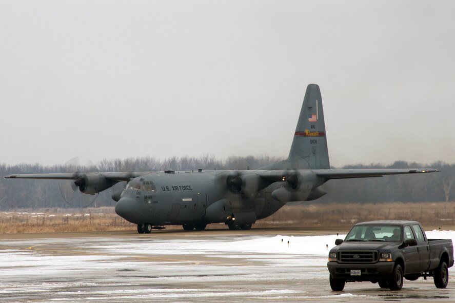A 133rd Airlift Wing C-130 "Hercules taxis on the runway  at Volk Field, Air National Guard Combat Readiness Training Center after arrival from St. Paul, Minnesota. The C-130 carries the Advanced Echelon portion of the 133rd Airlift Wing Airmen preparing the way for the "main body" taking part in a  operational readiness exercise at Volk field.  An OREs provide opportunities to identify and correct essential tasks for the  upcoming Operational Readiness Inspection.The other units involved along with the 133rd Airlift Wing are: the EOD from the 123rd Civil Engineering Squadron, Kentucky Air National Guard; the 94th Aerial Port Squadron, Dobbins Air Reserve Base, Ga.; the 156th Airlift Wing, Puerto Rico Air National Guard; and the 375th Air Mobility Wing, Scott AFB, Ill. All the units are preparing for a upcoming ORI in March 2010.U.S. Air Force photo/Tech Sgt. Erik Gudmundson
