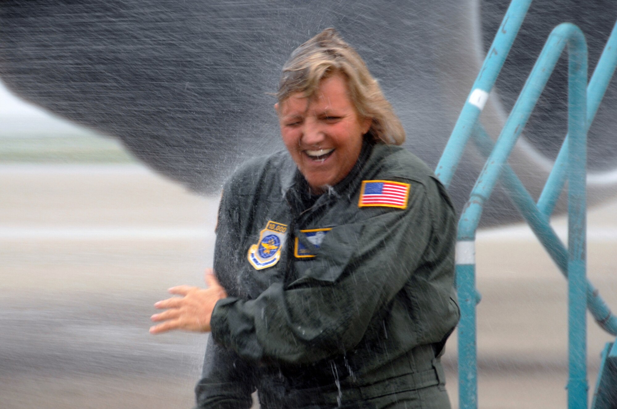 Senior Master Sgt. Sara Galvin, a former member of the 9th Air Refueling Squadron, is welcomed back by Travis members to honor her final flight before retiring from the Air Force earlier this month. In July 2009, Sergeant Galvin became one of the few career-enlisted female aviators to achieve the rare feat of 10,000 flying hours. (U.S. Air Force photo/Nan Wylie)