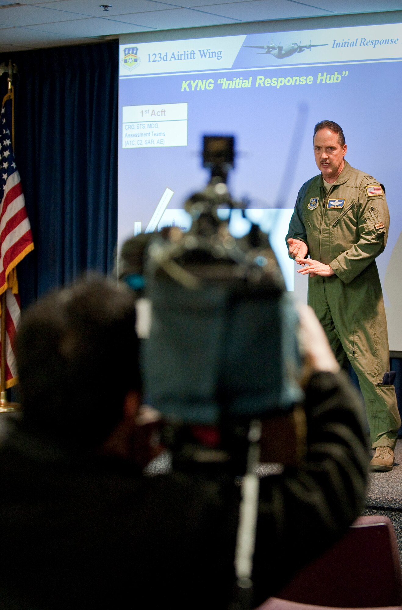 Col. Greg Nelson, commander of the Kentucky Air National Guard's 123rd Airlift Wing, briefs members of the news media Jan. 22, 2010, about the unit's deployment to the Dominican Republic to provide relief for victim's of the devastating earthquake in Haiti. Three C-130s and approximately 45 Kentucky Air National Guardsmen deployed from the Louisville, Ky.-based unit to establish an air cargo hub at Maria Montez International Airport. The hub will be responsible for controlling incoming aircraft, offloading relief supplies and staging them for further movement into Haiti. The Kentucky wing is the first Air National Guard unit to be deployed for such a mission. (U.S. Air Force photo by Maj. Dale Greer)