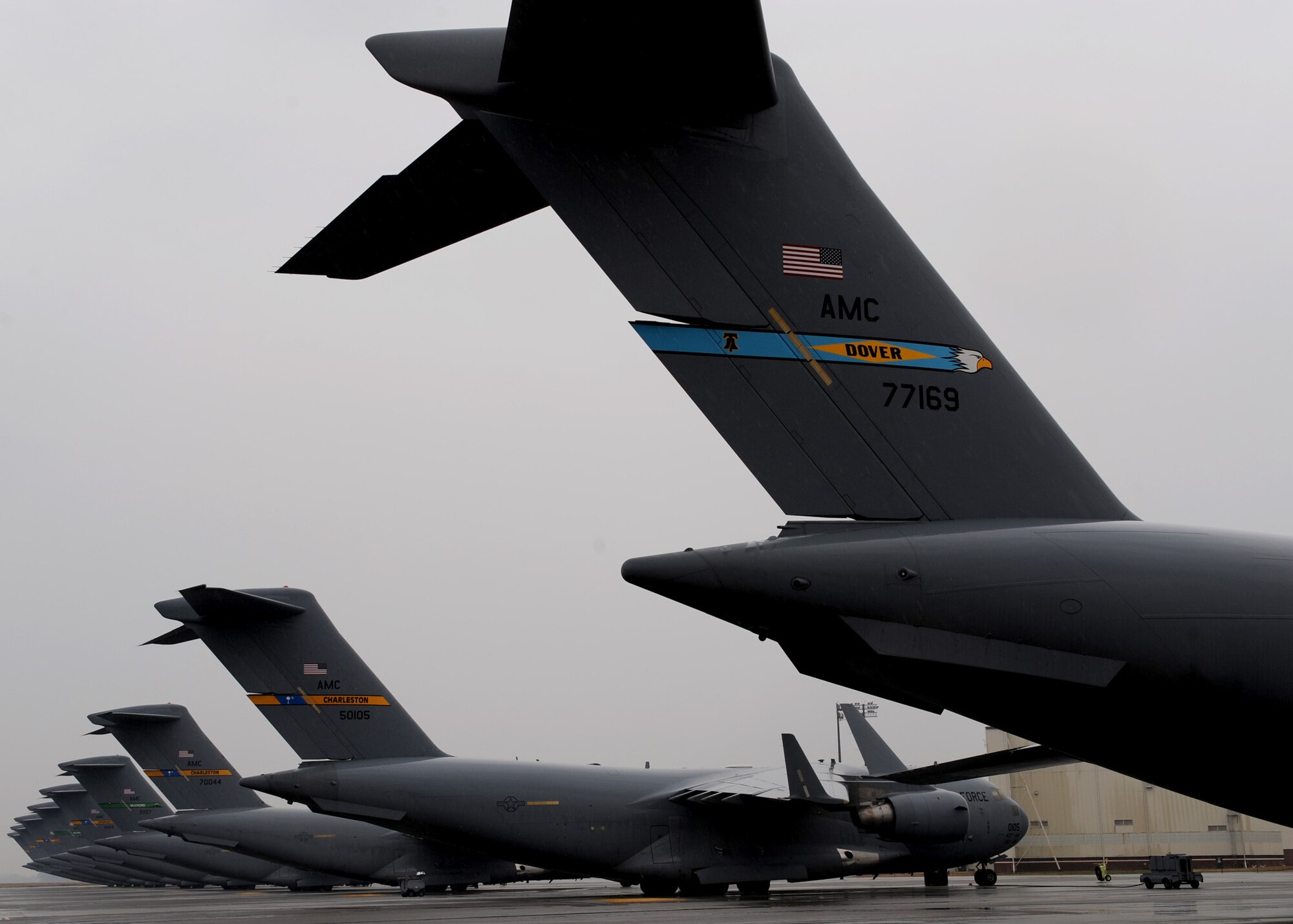 Several C-17 aircraft sit on the Charleston AFB flightline, Jan. 21. The planes are being used to support the humanitarian relief effort in Haiti. The Air Force's airlift capability enables the U.S. to respond immediately to any disaster domestically or worldwide. the U.S. is the only country with an aircraft fleet capable of providing this type of response.  (U.S. Air Force photo/Senior Airman Katie Gieratz)(RELEASED)
