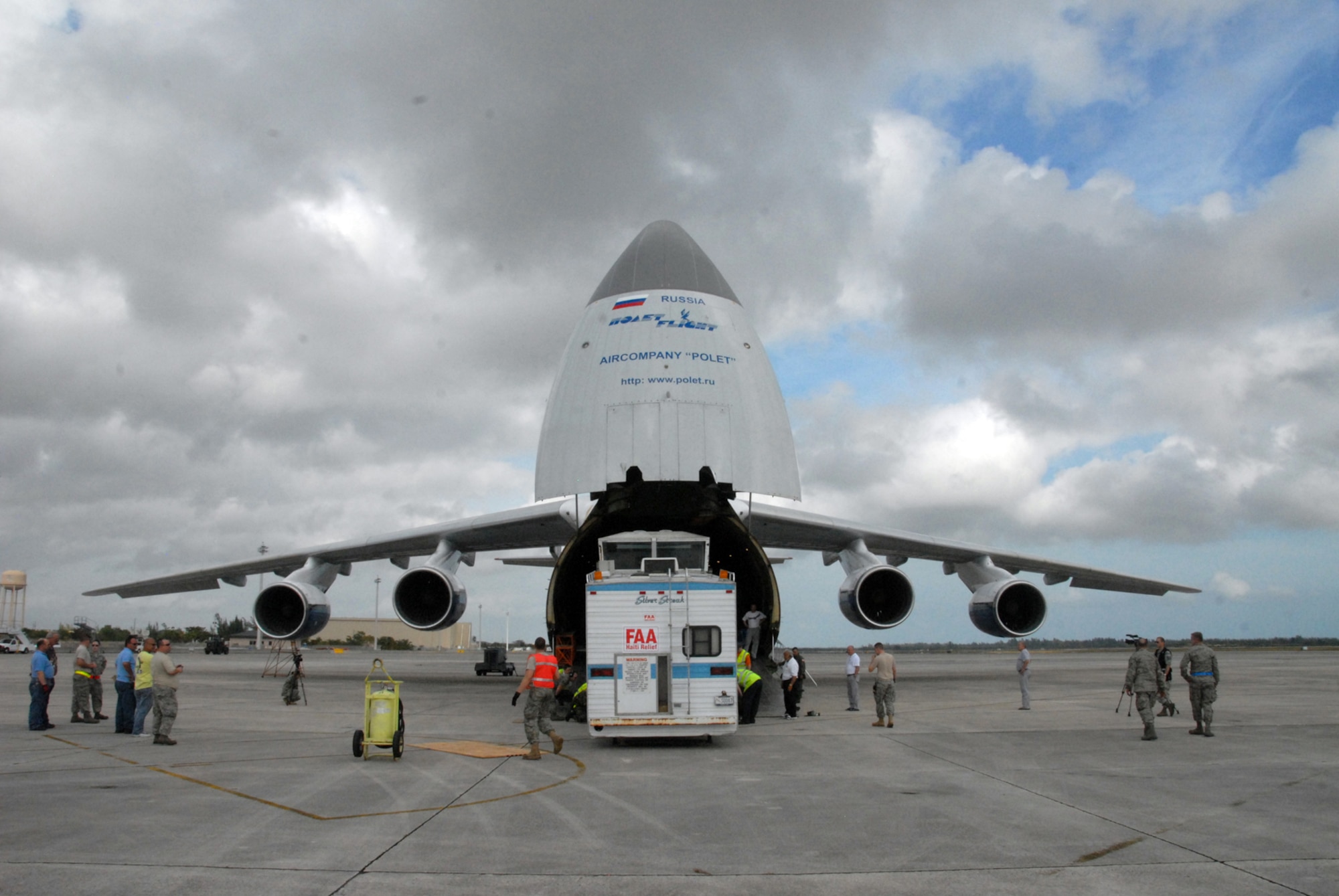 A mobile air traffic control tower is loaded onto a Russian Antonov An-124 cargo plane at Homestead Air Reserve Base, Fla., Jan. 21, 2010. The mobile air traffic control tower will increase the efficiency of aid being delivered to earthquake victims in Haiti. (U.S. Air Force photo/Tech. Sgt. Brian Bahret) 
