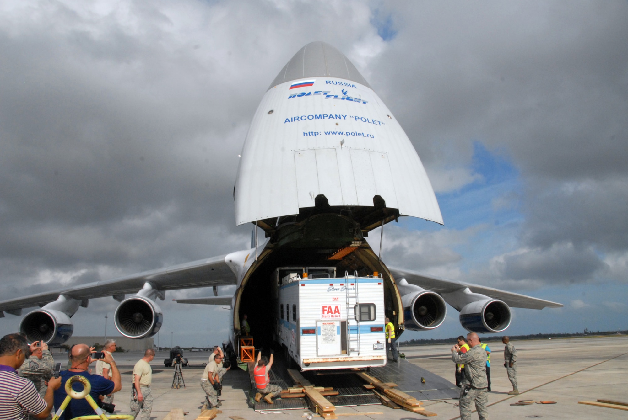 A mobile air traffic control tower is loaded onto a Russian Antonov An-124 cargo plane at Homestead Air Reserve Base, Fla., Jan. 21, 2010. The mobile air traffic control tower will increase the efficiency of aid being delivered to earthquake victims in Haiti. (U.S. Air Force photo/Tech. Sgt. Brian Bahret) 
