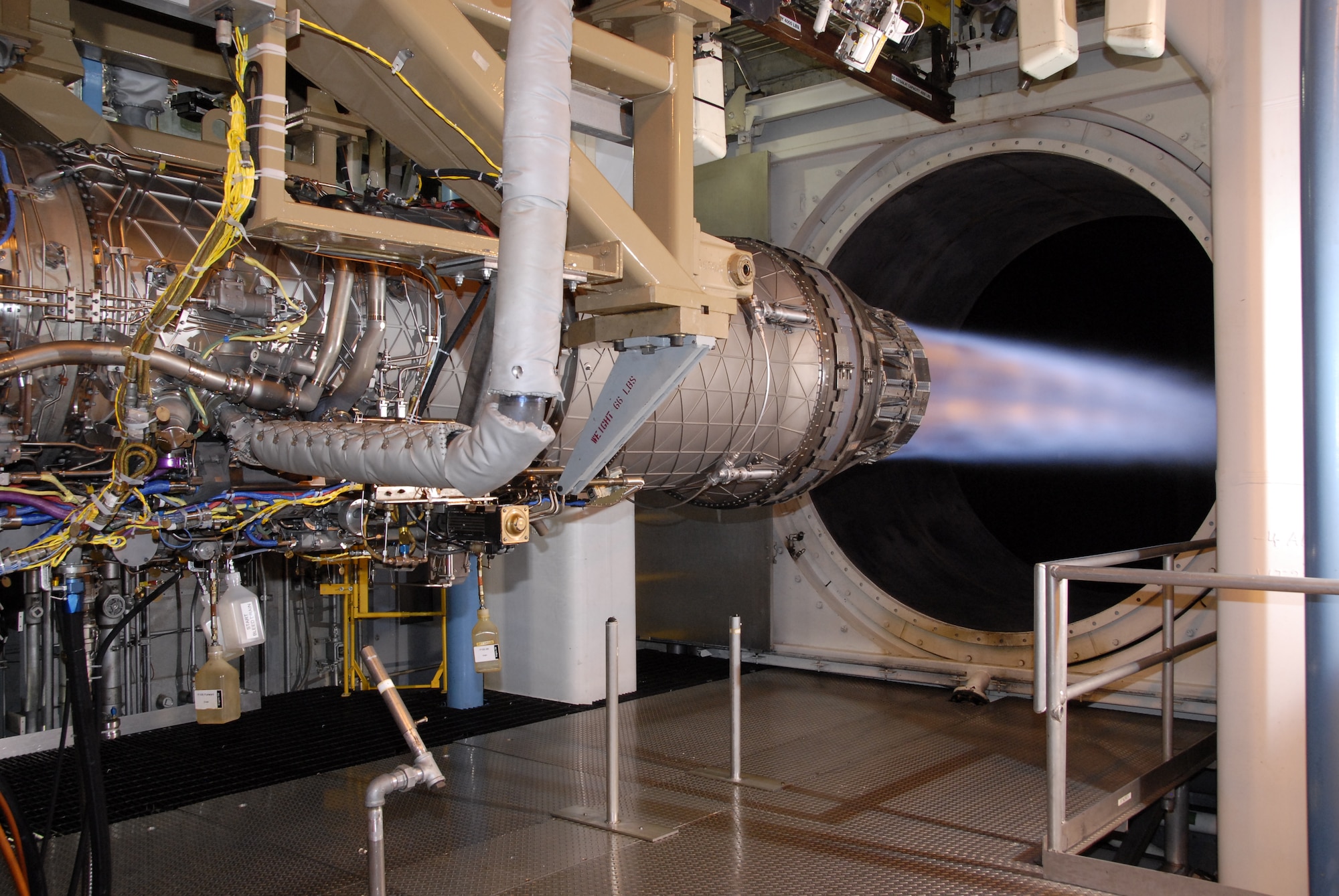 An F100-PW-229 Engine Enhancement Package engine undergoes ram testing in SL-3 as part of a year-long Accelerated Mission Test, the longest test of its kind at Arnold. Ram is a term describing test conditions in which inlet pressures are above ambient or atmospheric conditions. (Photo by Rick Goodfriend)