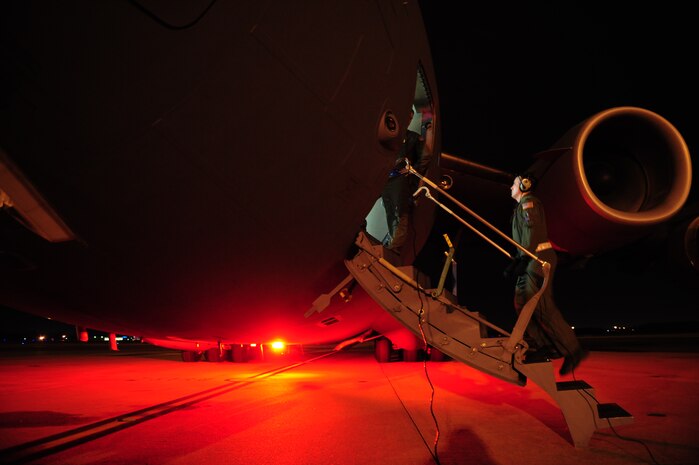 U.S. Air Force 1st Lt. David Redwine, a  pilot assigned to the 15th Airlift Squadron, Charleston Air Force Base, S.C., boards a C-17 Globemaster III before launching on an air delivery mission from Charleston AFB in support of Operation Unified Response Jan. 20, 2010. The mission was the second air delivery flown to Haiti since relief operations began. (U.S. Air Force photo by Staff Sgt. Jacob N. Bailey / Released)