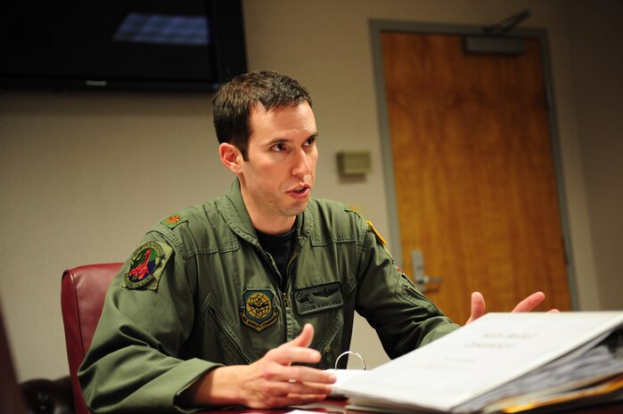 U.S. Air Force Maj. Jason Kirkland, a C-17 Globemaster III pilot assigned to the 15th Airlift Squadron, Charleston Air Force Base, S.C., briefs an aircrew prior to an air delivery mission in support of Operation Unified Response, Jan. 20, 2010. (U.S. Air Force photo/Staff Sgt. Jacob N. Bailey / Released)