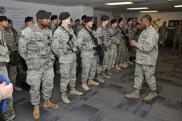 Brig. Gen. Jimmy McMillian, the HQ USAF/A7S, talks with members of the 341st Security Forces Squadron Bravo Flight during guardmount Jan. 14. While there, he presented the Air Force Commendation Medal to Tech. Sgt. Brian Griffitts. (U.S. Air Force photo/John Turner)