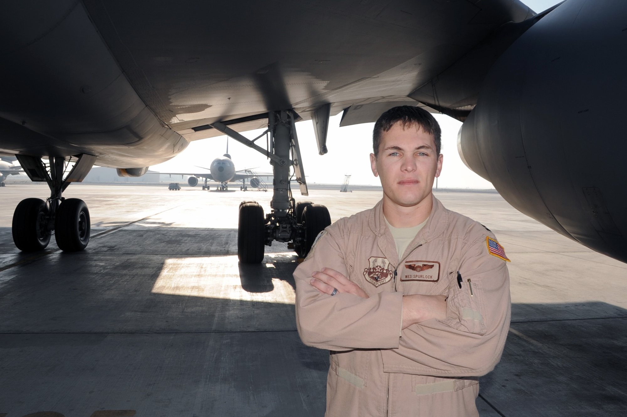 Capt. Wes Spurlock is a KC-10 Extender pilot with the 908th Expeditionary Air Refueling Squadron at a non-disclosed location in Southwest Asia. Here he is pictured next to a KC-10 on Jan. 22, 2010. Captain Spurlock is a 10-year veteran and  in his deployed duties drives the biggest air refueling aircraft in the Air Force inventory for combat air refueling missions in support of Operations Iraqi Freedom and Enduring Freedom and the Combined Joint Task Force-Horn of Africa. The captain is deployed from Travis Air Force Base, Calif., and his hometown is Norco, Calif. (U.S. Air Force Photo/Tech. Sgt. Scott T. Sturkol/Released) 