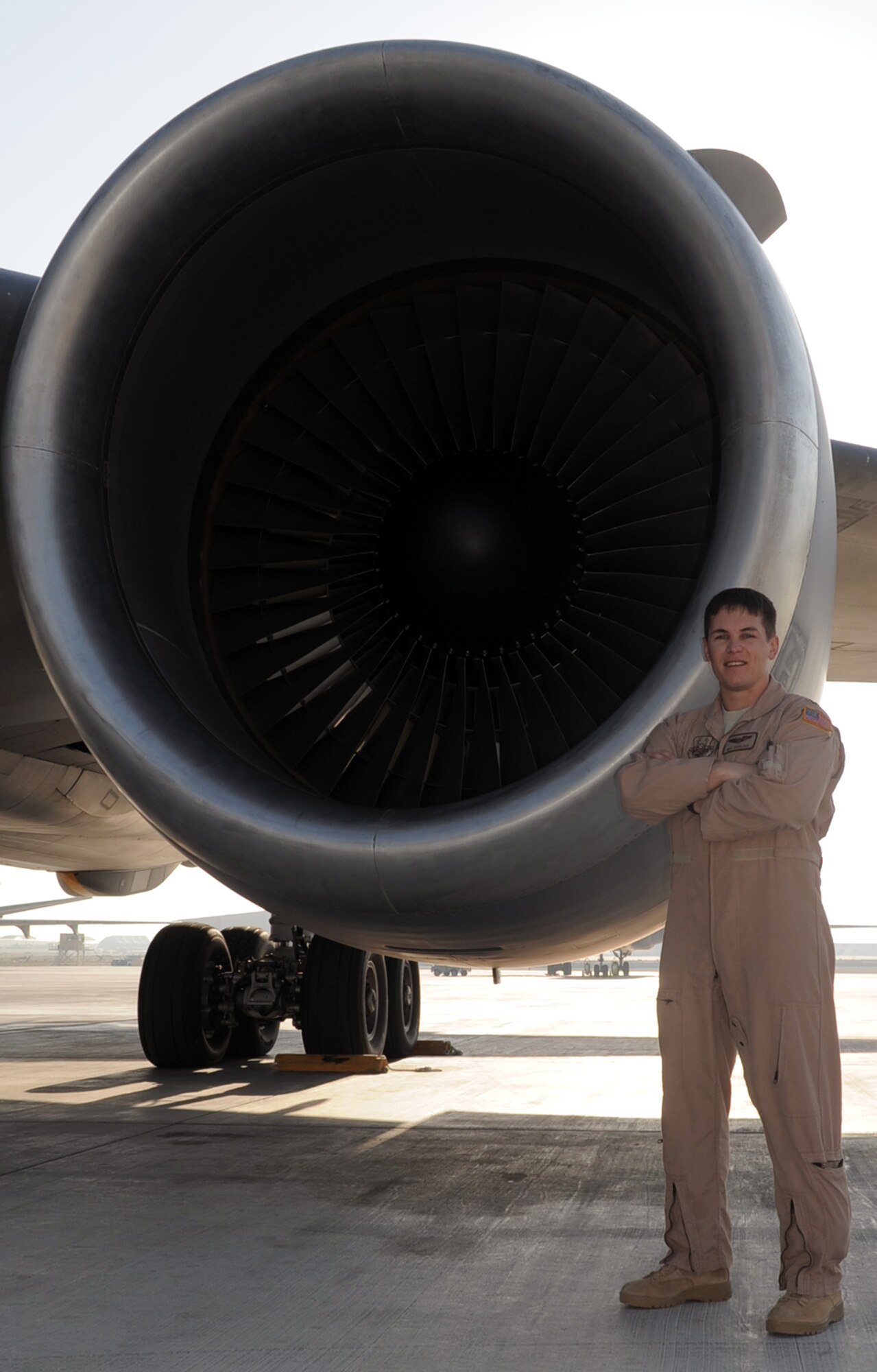 Capt. Wes Spurlock is a KC-10 Extender pilot with the 908th Expeditionary Air Refueling Squadron at a non-disclosed location in Southwest Asia. Here he is pictured next to a KC-10 on Jan. 22, 2010. Captain Spurlock is a 10-year veteran and  in his deployed duties drives the biggest air refueling aircraft in the Air Force inventory for combat air refueling missions in support of Operations Iraqi Freedom and Enduring Freedom and the Combined Joint Task Force-Horn of Africa. The captain is deployed from Travis Air Force Base, Calif., and his hometown is Norco, Calif. (U.S. Air Force Photo/Tech. Sgt. Scott T. Sturkol/Released) 