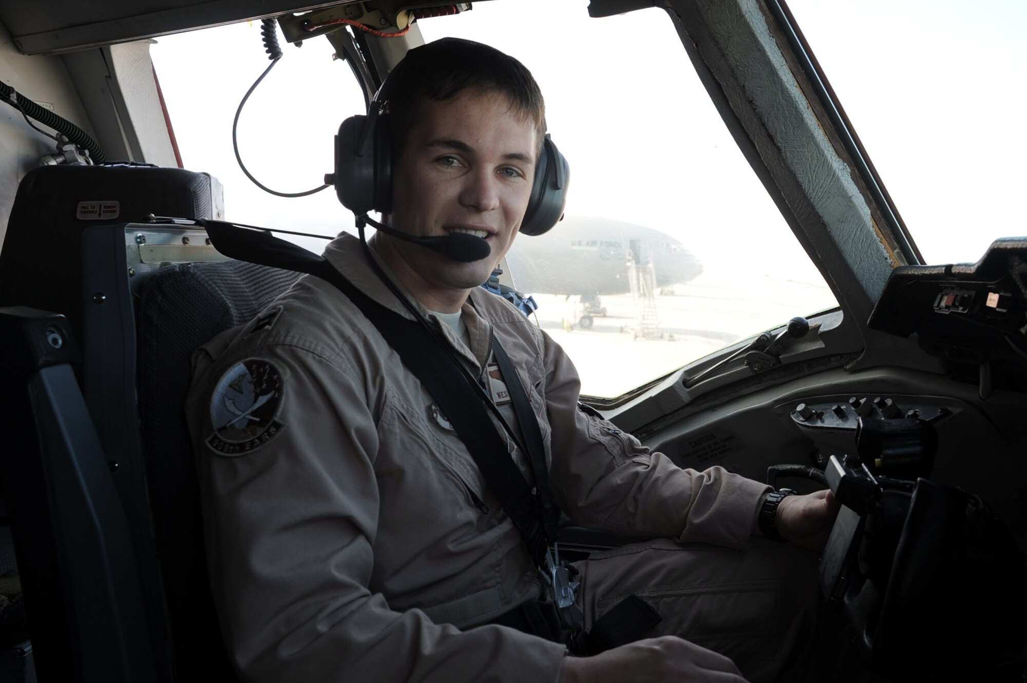 Capt. Wes Spurlock is a KC-10 Extender pilot with the 908th Expeditionary Air Refueling Squadron at a non-disclosed location in Southwest Asia. Here he is pictured in a KC-10 on Jan. 22, 2010. Captain Spurlock is a 10-year veteran and  in his deployed duties drives the biggest air refueling aircraft in the Air Force inventory for combat air refueling missions in support of Operations Iraqi Freedom and Enduring Freedom and the Combined Joint Task Force-Horn of Africa. (U.S. Air Force Photo/Tech. Sgt. Scott T. Sturkol/Released) 