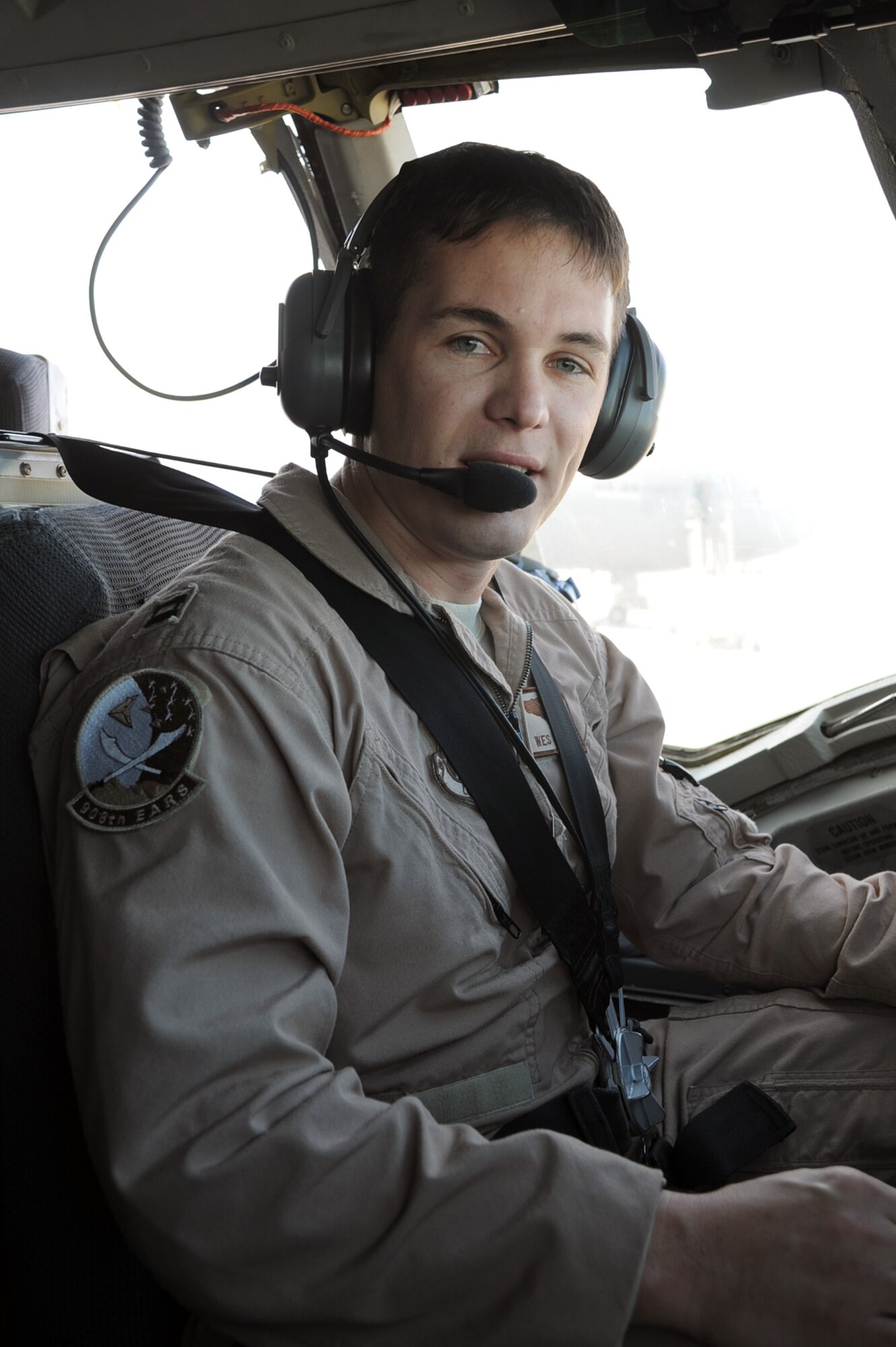 Capt. Wes Spurlock is a KC-10 Extender pilot with the 908th Expeditionary Air Refueling Squadron at a non-disclosed location in Southwest Asia. Here he is pictured in a KC-10 on Jan. 22, 2010. Captain Spurlock is a 10-year veteran and  in his deployed duties drives the biggest air refueling aircraft in the Air Force inventory for combat air refueling missions in support of Operations Iraqi Freedom and Enduring Freedom and the Combined Joint Task Force-Horn of Africa. (U.S. Air Force Photo/Tech. Sgt. Scott T. Sturkol/Released) 