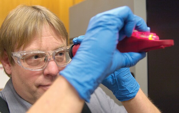 “A lot of people think you just grab a truck and pump fuel (into an aircraft) and away you go,” said 72nd Logistics Readiness Squadron’s Base Fuels Quality Assurance Office fuels specialist Chris Albrecht. “There’s a lot to it.” Mr. Albrecht uses a refractometer to check a fuel sample for icing inhibitor, an additive put into fuel at the refinery to prevent any water in the fuel from freezing. (Air Force photos by Margo Wright)