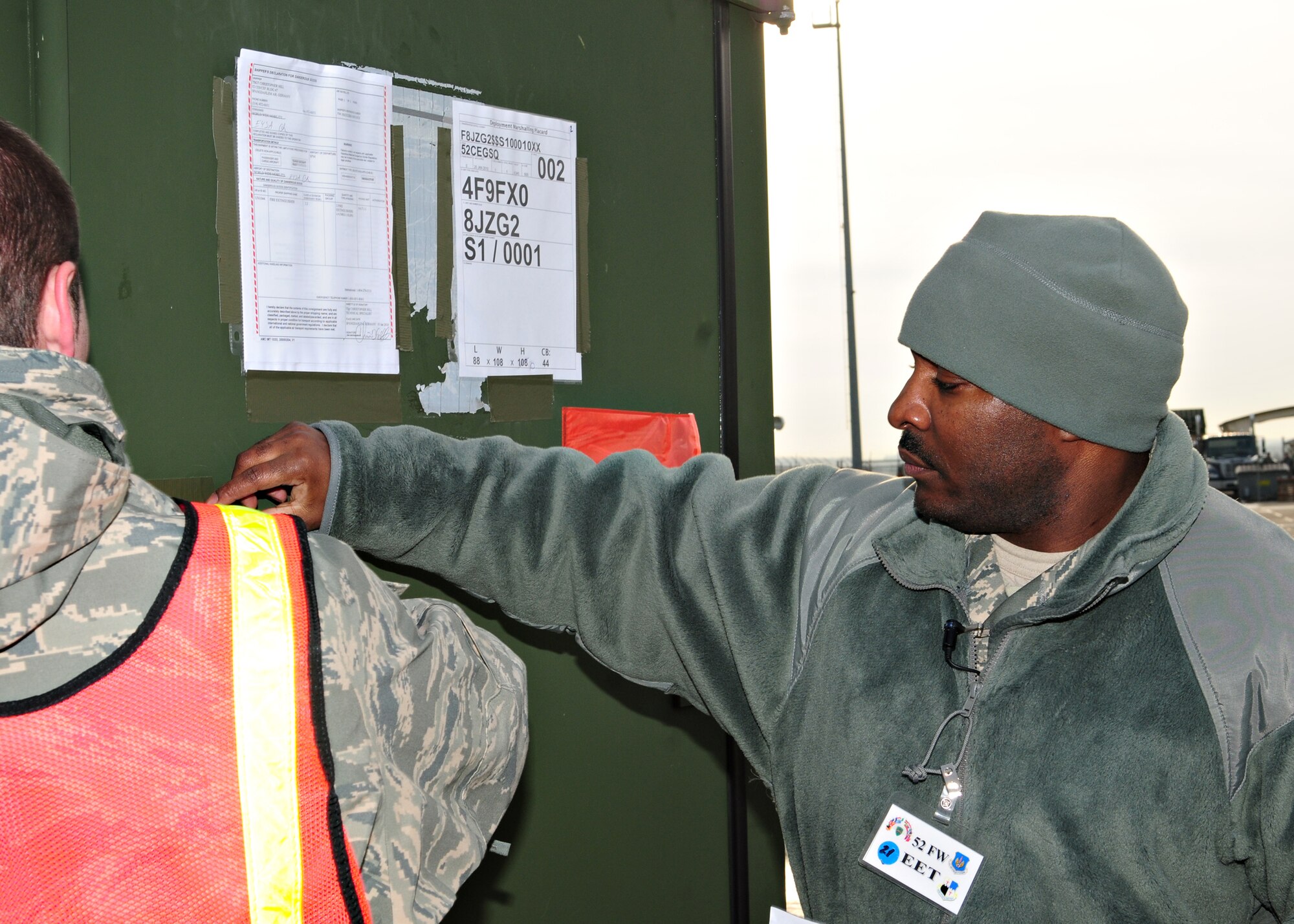 SPANGDAHLEM AIR BASE, Germany -- Tech. Sgt. Reginald Prince, 52nd Fighter Wing exercise evaluation team member, inspects a container list on ramp five during Operation Saber Crown 10-3 Jan. 20. Cargo has to be correctly packaged and labeled prior to deployment. (U.S. Air Force photo/Staff Sgt. Heather M. Norris)
