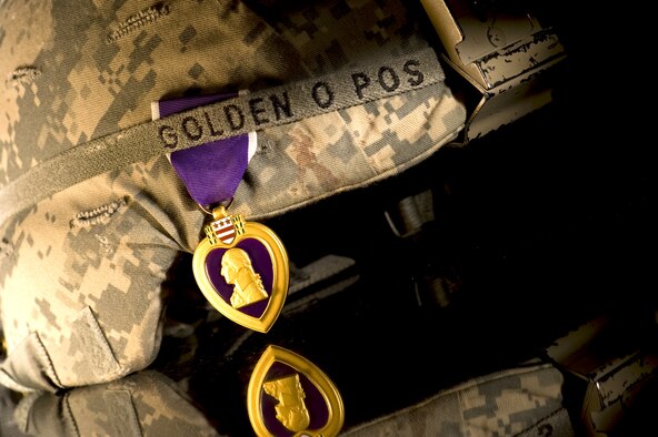 Wounded during an enemy rocket attack in Afghanistan, a Purple Heart recipient talks about the day that almost kept him from ever returning to his young bride and 11-day-old daughter. (photo by TSgt Samuel Bendet)