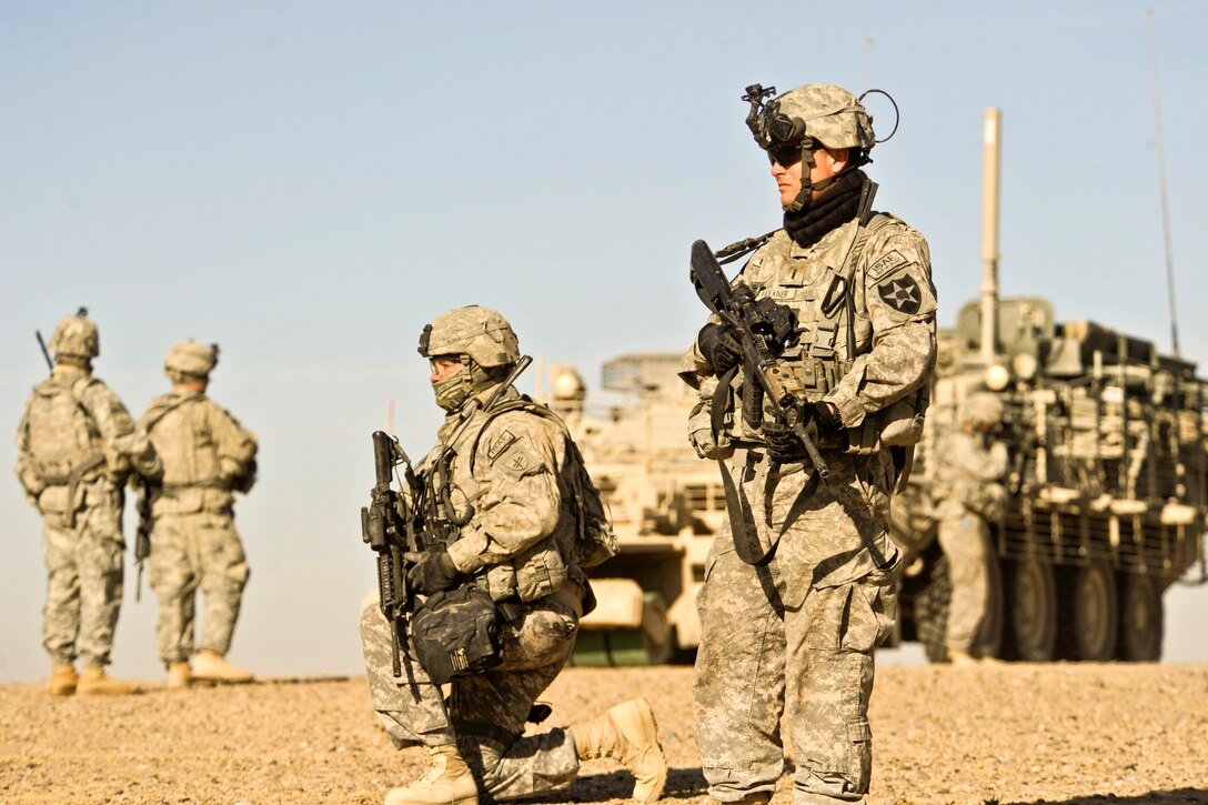 U.S. Army soldiers conduct a combat patrol in Helmand province ...