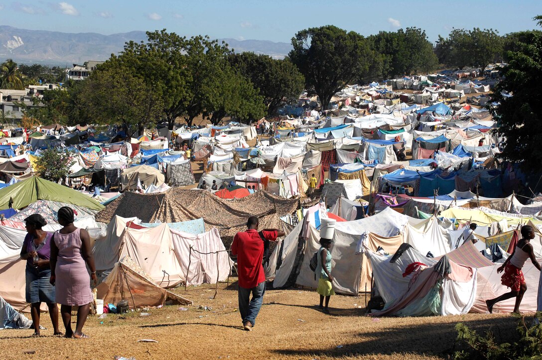 As many as 50,000 Haitians sleep in this earthquake survivor camp in the Del Mas area in Port-au-Prince, Haiti, Jan. 21, 2010. It has grown by thousands since the U.S. Army 82nd Division's 1st Squadron, 73rd Cavalry Squadron started distributing food and water here last week. 
