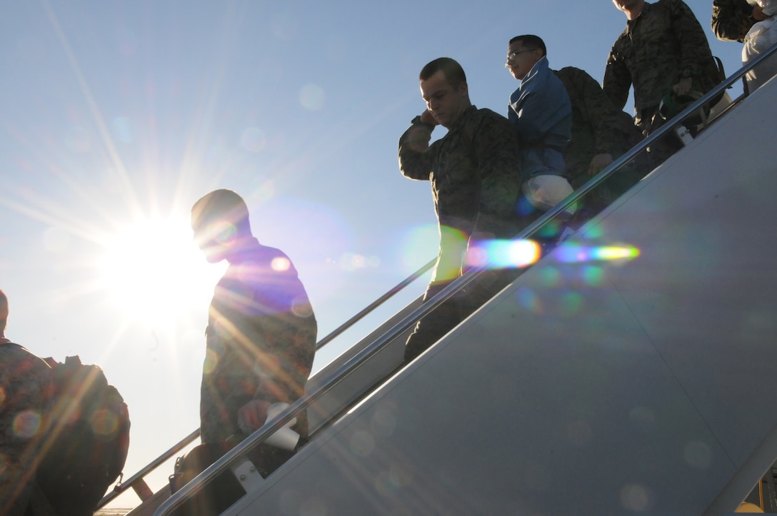 Marines from Marine Attack Squadron 513 get off an Air Force KC-135 at the Marine Corps Air Station in Yuma, Ariz., Jan. 23, 2010, after returning from a six-month deployment with the 31st Marine Expeditionary Unit based in Japan. A detachment of four AV-8B Harriers and approximately 45 Marines reunited with friends and family at the Nightmares’ hangar. “The Marines did splendidly while on deployment,” said Lt. Col. Marcus Annibale, VMA-513 commanding officer. “They represented our country and Corps well and we didn’t have a single problem while there.” While on deployment, the Nightmares participated in exercises Wolmi-Do Fury and Ryuku Warrior.
