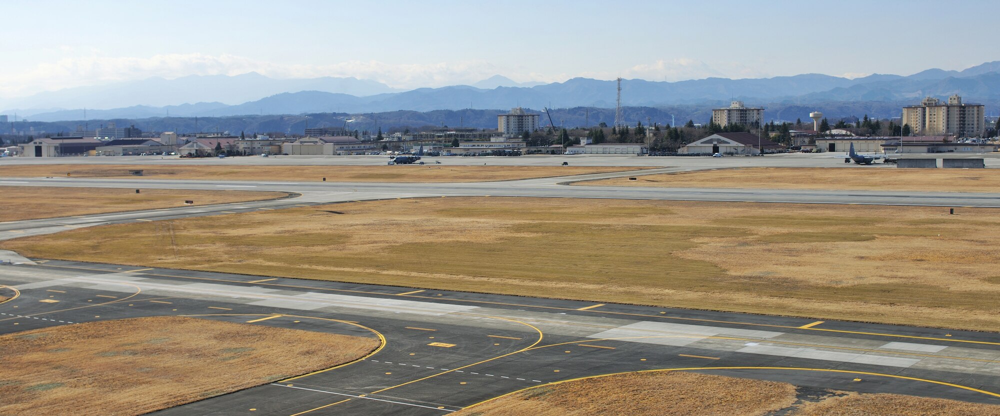 YOKOTA AIR BASE, Japan -- The plan for building the new control tower began seven years ago. Yokota's newest control tower and RAPCON grand opening was held Jan. 22. This is the view of Yokota Flight line from the top of control tower. (U.S. Air Force photo/Osakabe Yasuo)