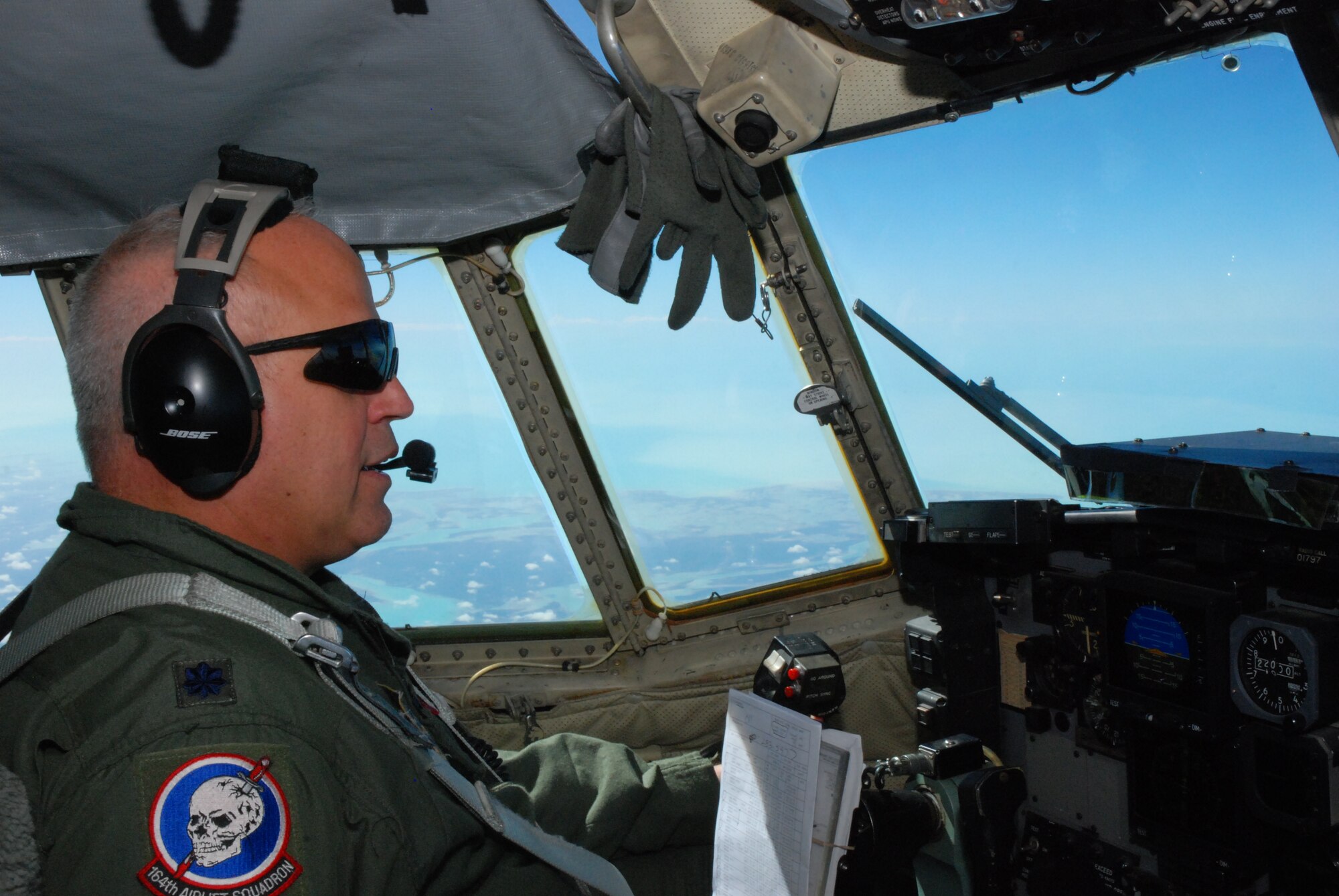 Lt. Col. Ken Pecoraro, 35th Expeditionary Airlift Squadron pilot, assigned from the 179th Airlift Wing, Mansfield, Ohio, performs his sixth Operation Unified Response mission in support of the earthquake victims of Haiti. Colonel Pecoraro's aircrews were the first to provide airlift support to Haiti in response to the alert issued by U.S. Southern Command to the Coronet Oak operations based at Muñiz Air National Guard Base, Puerto Rico. (U.S. Air Force photo/Master Sgt. Stan Coleman)