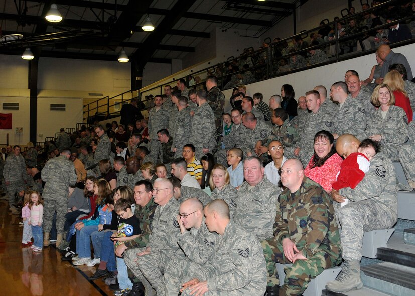 Members of the 131st Bomb Wing, attached units, friends and family members gather in the stands at Ritenour High School Jan. 23 for the Hometown Heroes Salute ceremony.  More than 200 Airmen were honored with a letter of appreciation, coin, center of influence medallion, rosewood pen set and dog tags for their outstanding support in deployments from Operations Enduring Freedom, Iraqi Freedom and Noble Eagle. (Photo by Master Sgt. Mary-Dale Amison)