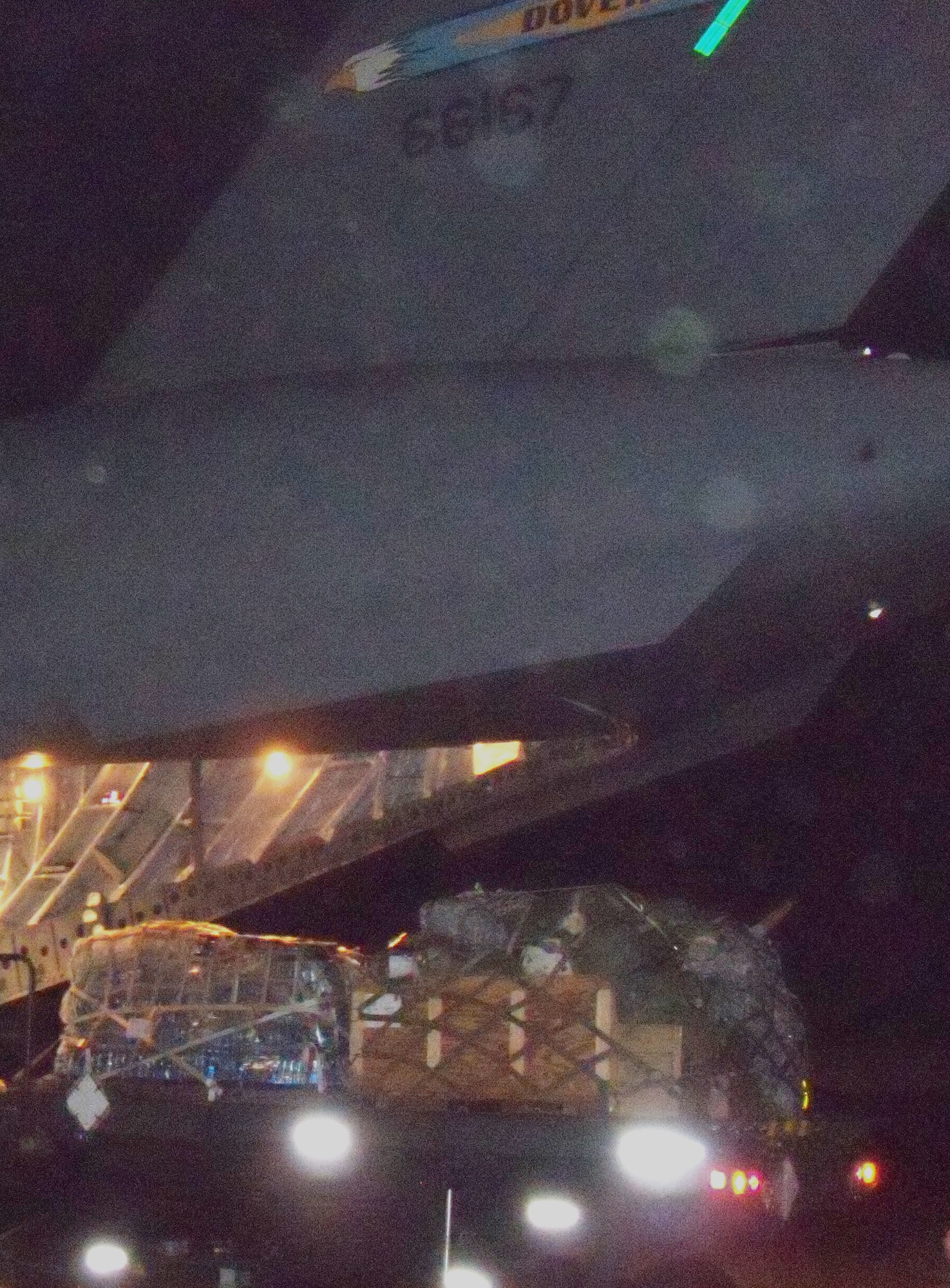 A C-17 Globemaster III from the 3rd Airlift Squadron drops off 90,000 pounds of disaster relief aid at the Port-au-Prince airport in Haiti on Jan. 19 in support of Operation Unified Response. After unloading all the cargo, they loaded 36 evacuees and brought them into the United States. (U.S. photo/2d Lt. Abigail Wise)              