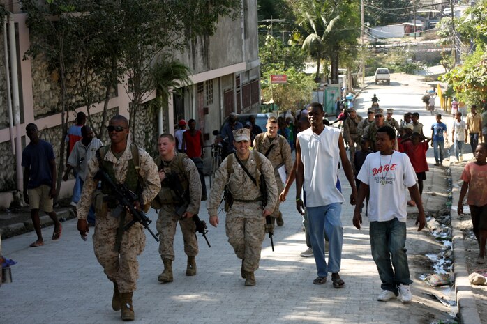 Marines with the 24th MEU assess damage caused by earthquakes in Haiti in the town of Mirebalais.  Three 10-man teams flew to Northern Haiti on MV-22 Ospreys to conduct the assessment, which included meeting with hospital officials, police leaders, the town mayor and United Nations leadership.