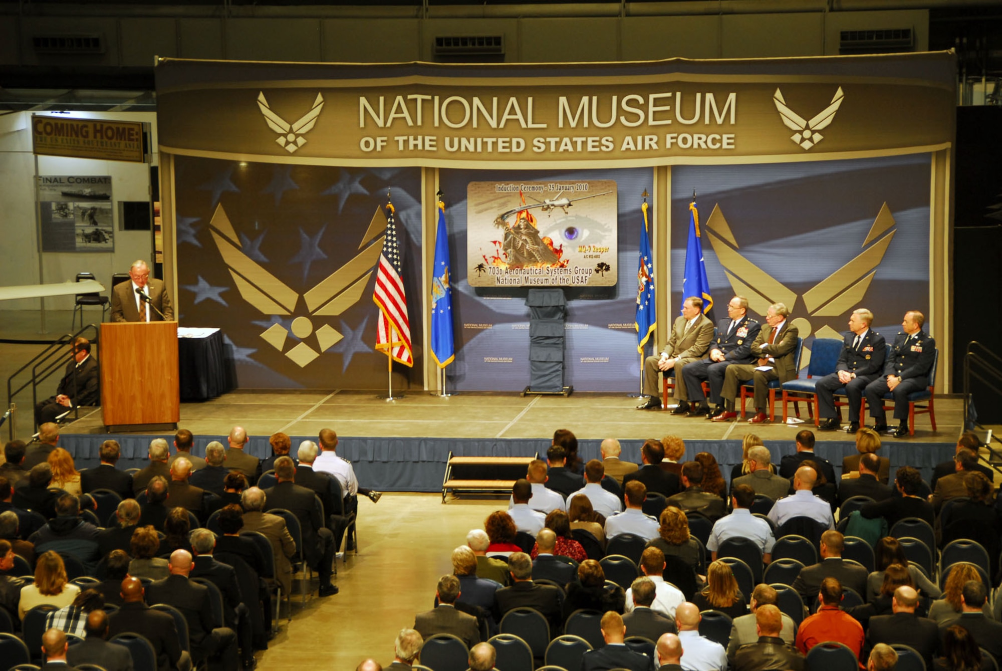 DAYTON, Ohio -- Thomas J. Cassidy Jr., president of General Atomics Aeronautical Systems, Inc. Aircraft Systems Group, addresses the audience during the MQ-9 Reaper exhibit opening at the National Museum of the U.S. Air Force on Jan. 25, 2010. (U.S. Air Force photo)