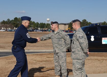 Chief Master Sgt. of the Air Force James Roy greets Staff Sgt. Juan Garcia, 14th Security Forces Squadron, and Staff Sgt. Thomas Blandino, during the first day of the chiefs visit to Columbus AFB Jan. 25. (U.S. Air Force photo/Elizabeth Owens). 