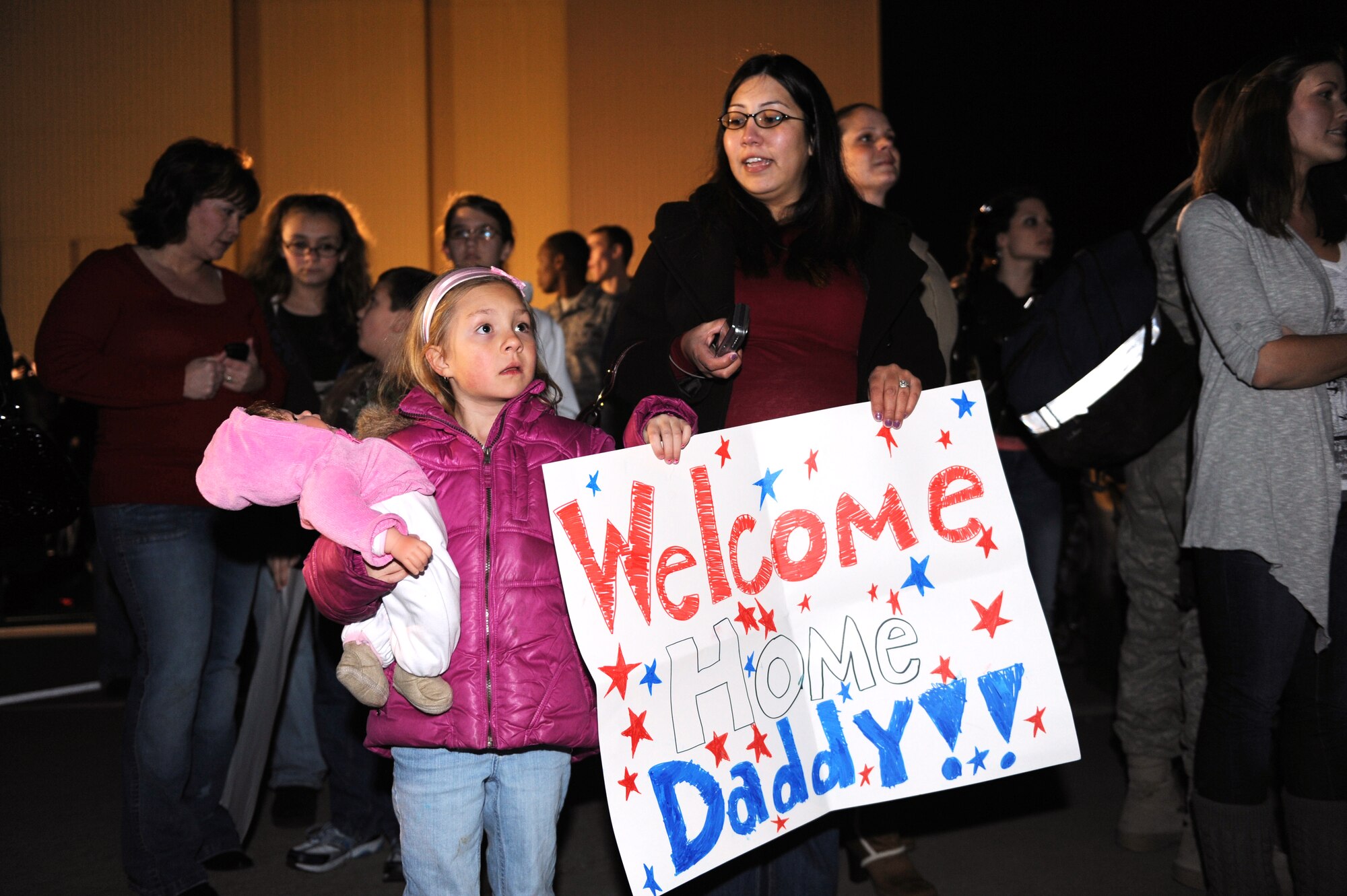 SHAW AIR FORCE BASE, S.C. -- Family members await the return of Aimen assigned to the 20th Fighter Wing. Hundreds of Airmen returned this week after a four-month deployment in support of NATO efforts in Afghanistan.  (U.S. Air Force Photo/Tech. Sgt. Louis Rivers)
