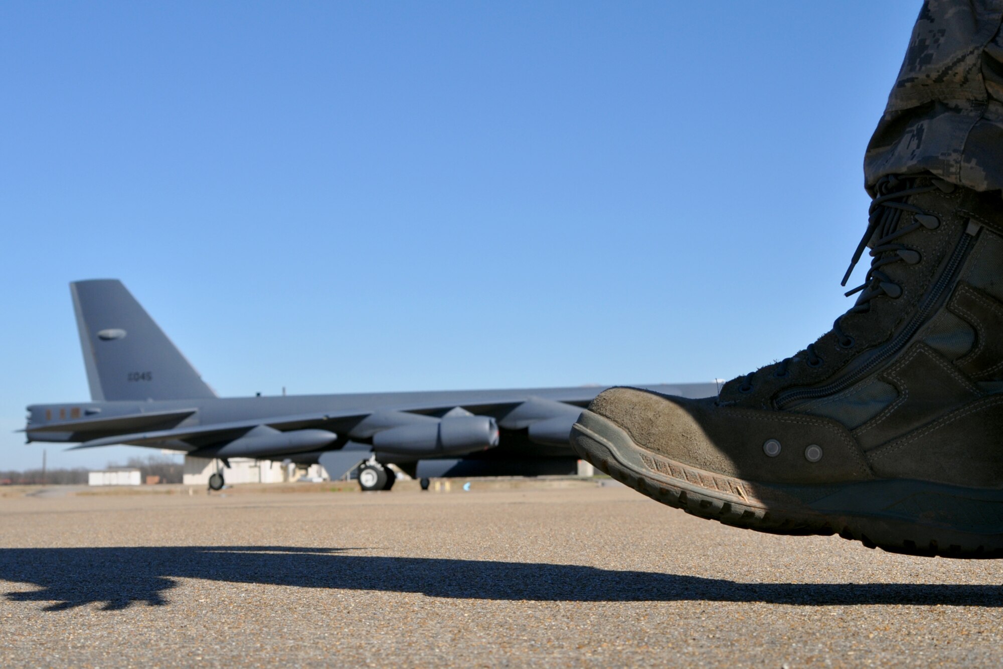 The 917th Aircraft Maintenance Squadron on Barksdale Air Force Base, La., made up of both 917th personnel and Regular Air Force members attached to the unit, conducts a foreign object damage (FOD) walk on Barksdale’s flight line Jan. 22, 2010. The 917th AMXS walk the flight line every Friday, collecting any type of FOD, and removing it in order to minimize the chances of damage to aircraft on base.  Rocks, broken pavement or garbage are all considered to be FOD. These objects could cut into aircraft tires, become ingested into the engines of the aircraft or could possibly be thrown by jet blast, damaging planes or injuring personnel.  (U.S. Air Force Photo/Senior Airman Crystal Marie Jordan)