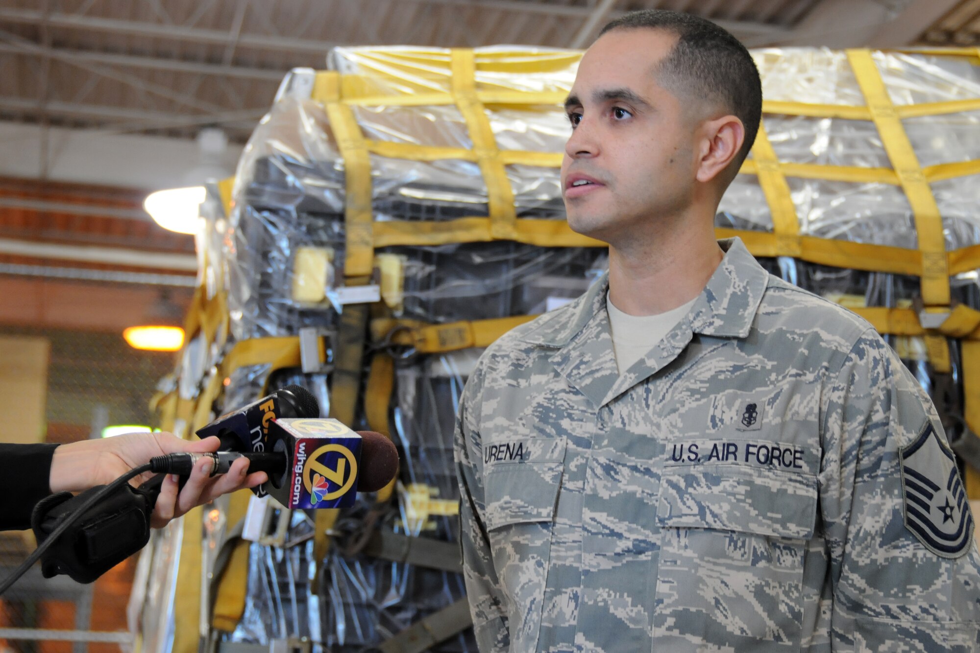 Master Sgt. Christian Urena, 96th Medical Support Squadron, talks to a reporter Jan. 22 at a press conference held about the group deploying personnel and supplies to the humanitarian effort in Haiti.  The medical group has currently deployed approximately 10 Airmen and $300,000 in supplies to the effort.  (U.S. Air Force photo/Airman 1st Class Anthony Jennings.) 