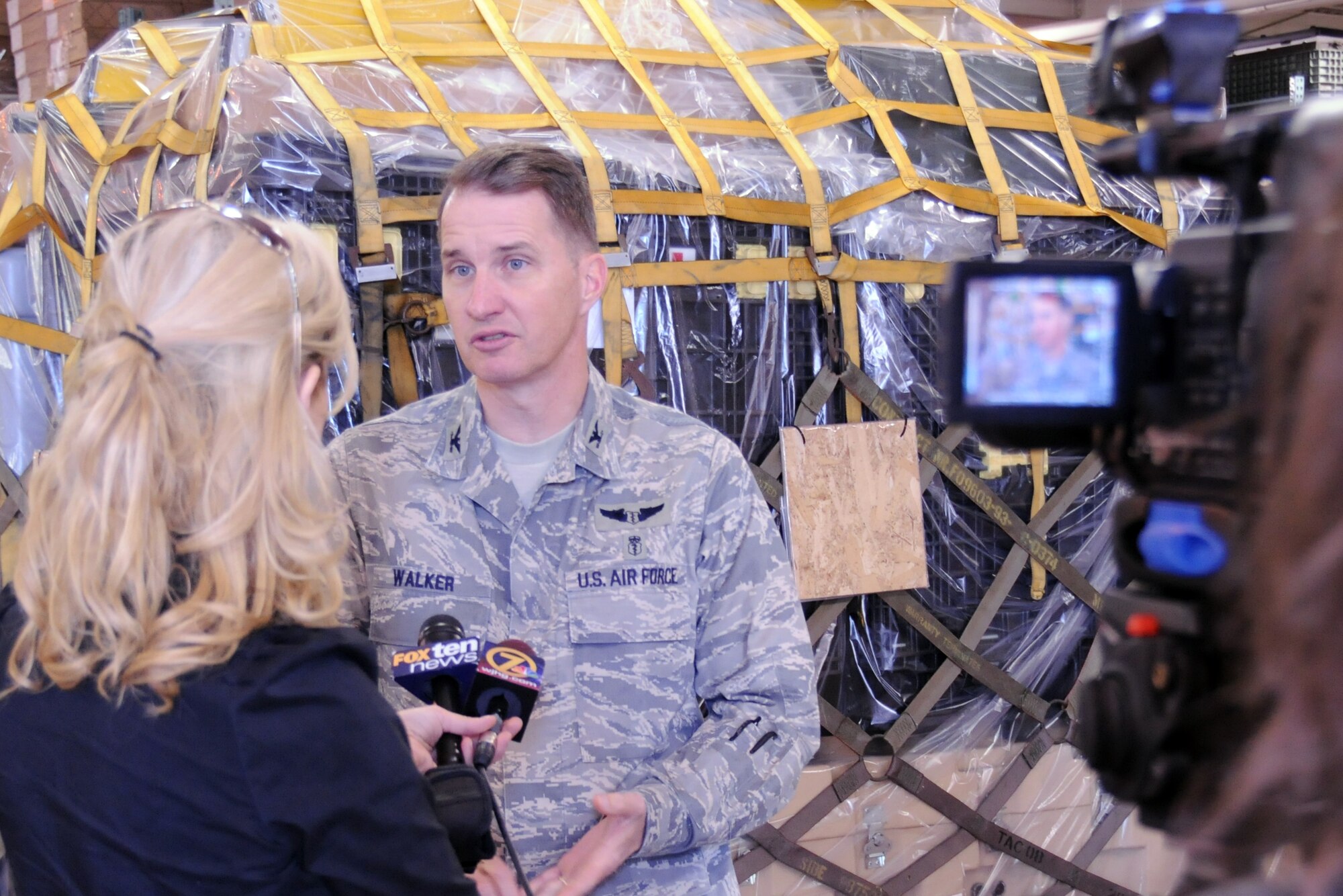 Col. Gary Walker, 96th Medical Group commander, talks to a reporter Jan. 22 at a press conference held about the group deploying personnel and supplies to the humanitarian effort in Haiti.  The medical group has currently deployed approximately 10 Airmen and $300,000 in supplies to the effort.  (U.S. Air Force photo/Airman 1st Class Anthony Jennings.) 