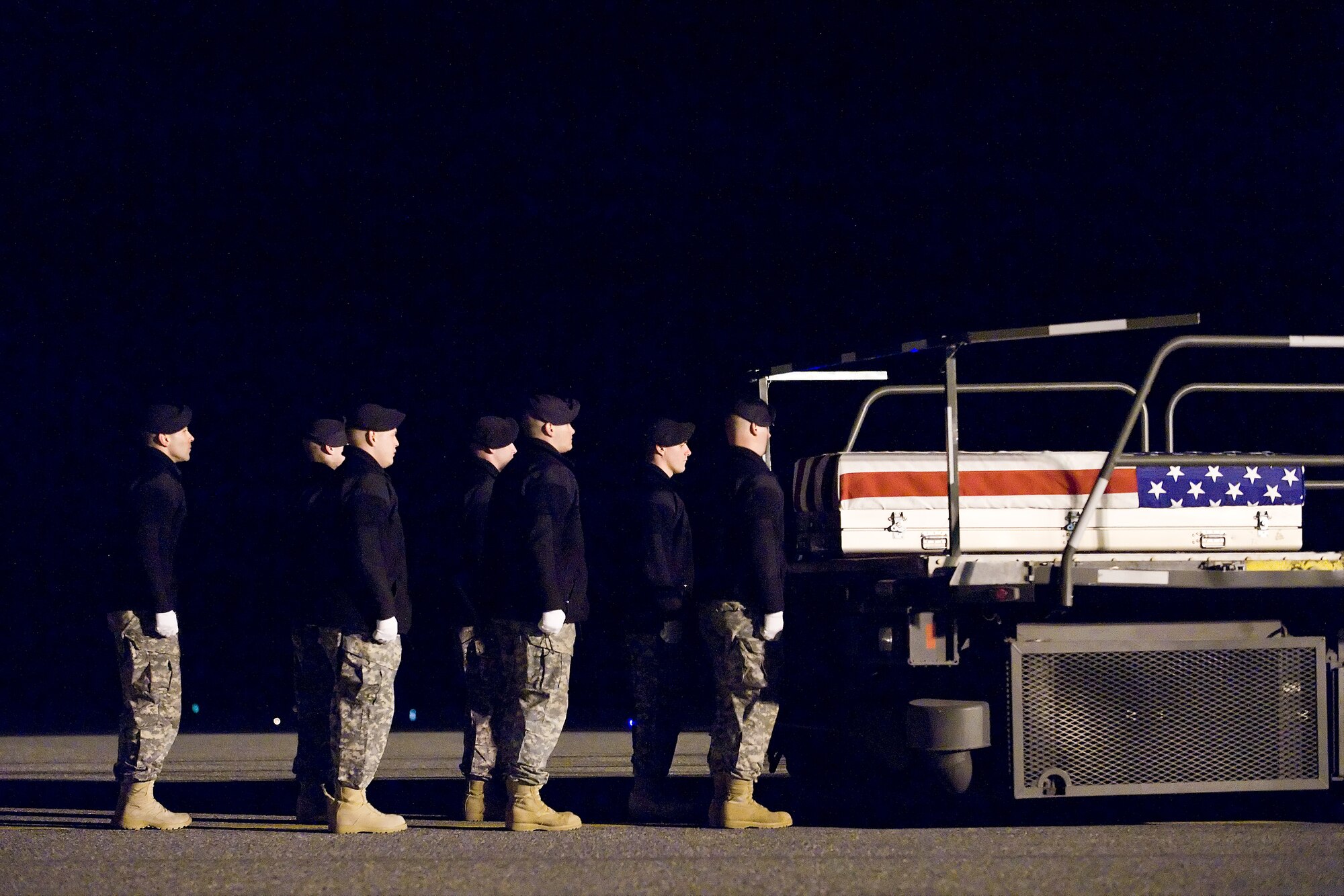 A U.S. Army carry team transfers the remains of Army Pfc. Gifford E. Hurt, of Yonkers, N.Y., at Dover Air Force Base, Del., January 22. (U.S. Air Force photo/Roland Balik)