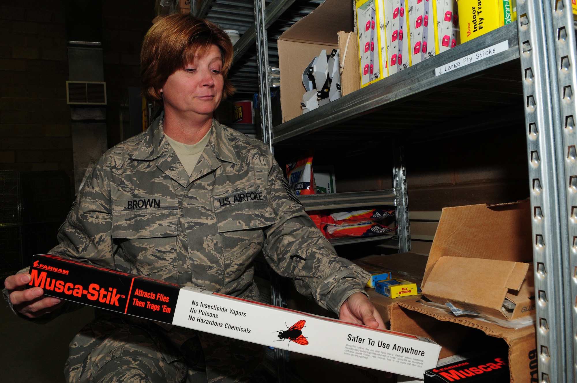 U.S. Air Force Tech. Sgt. Leslie Brown, 386th Expeditionary Civil Engineer Squadron Pest Management flight, inventories stock Jan. 20, 2010 at an air base in Southwest Asia. Sergeant Brown, a Choctaw, Okla., native, is deployed from the 137th Air Refueling Wing, Will Rogers Air National Guard Base, Okla. (U.S. Air Force photo by Staff Sgt. Lakisha A. Croley/Released)