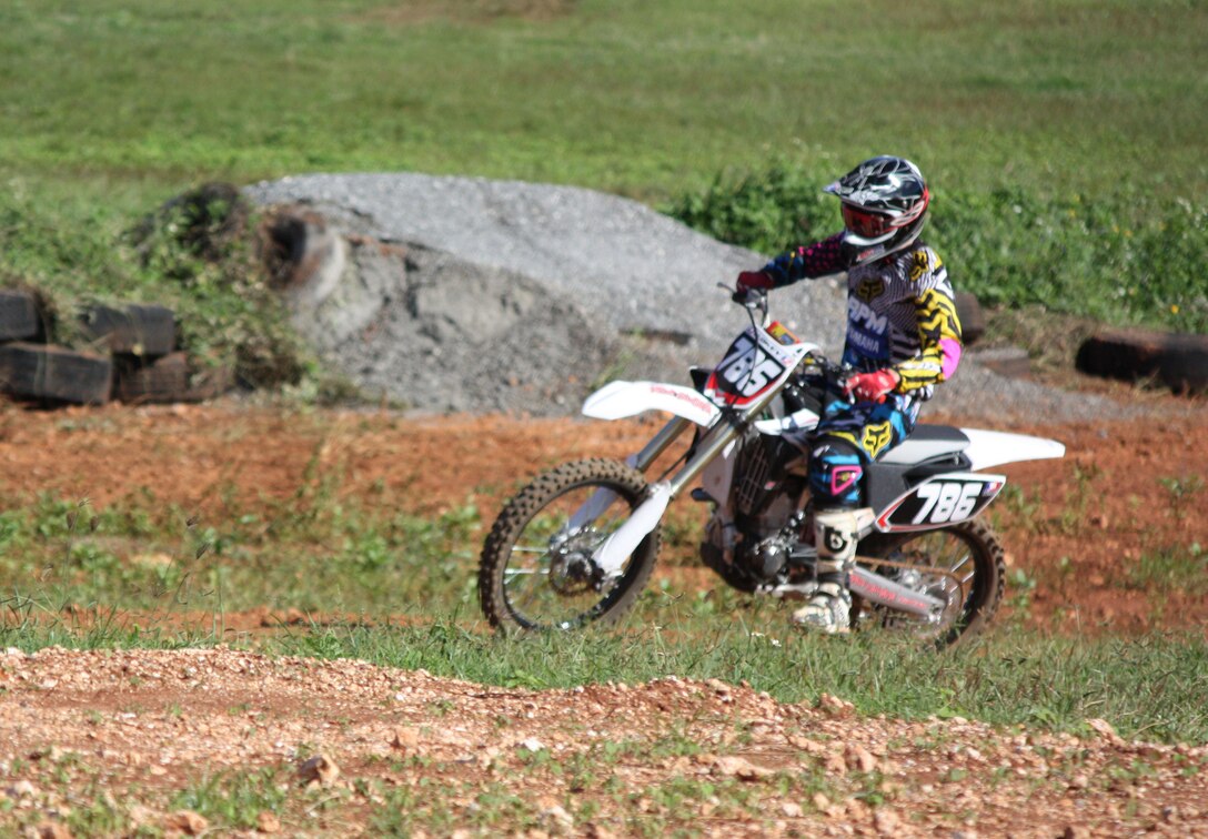 ANDERSEN AIR FORCE BASE, Guam - Senior Airman Jess Clokey, 734th AirMobility Squadron, competes in the 2009 Open-Class Motocross ChampionshipDec. 6. Airman Clokey took home the championship and finished the year with13 race wins on Guam. (Courtesy photo)