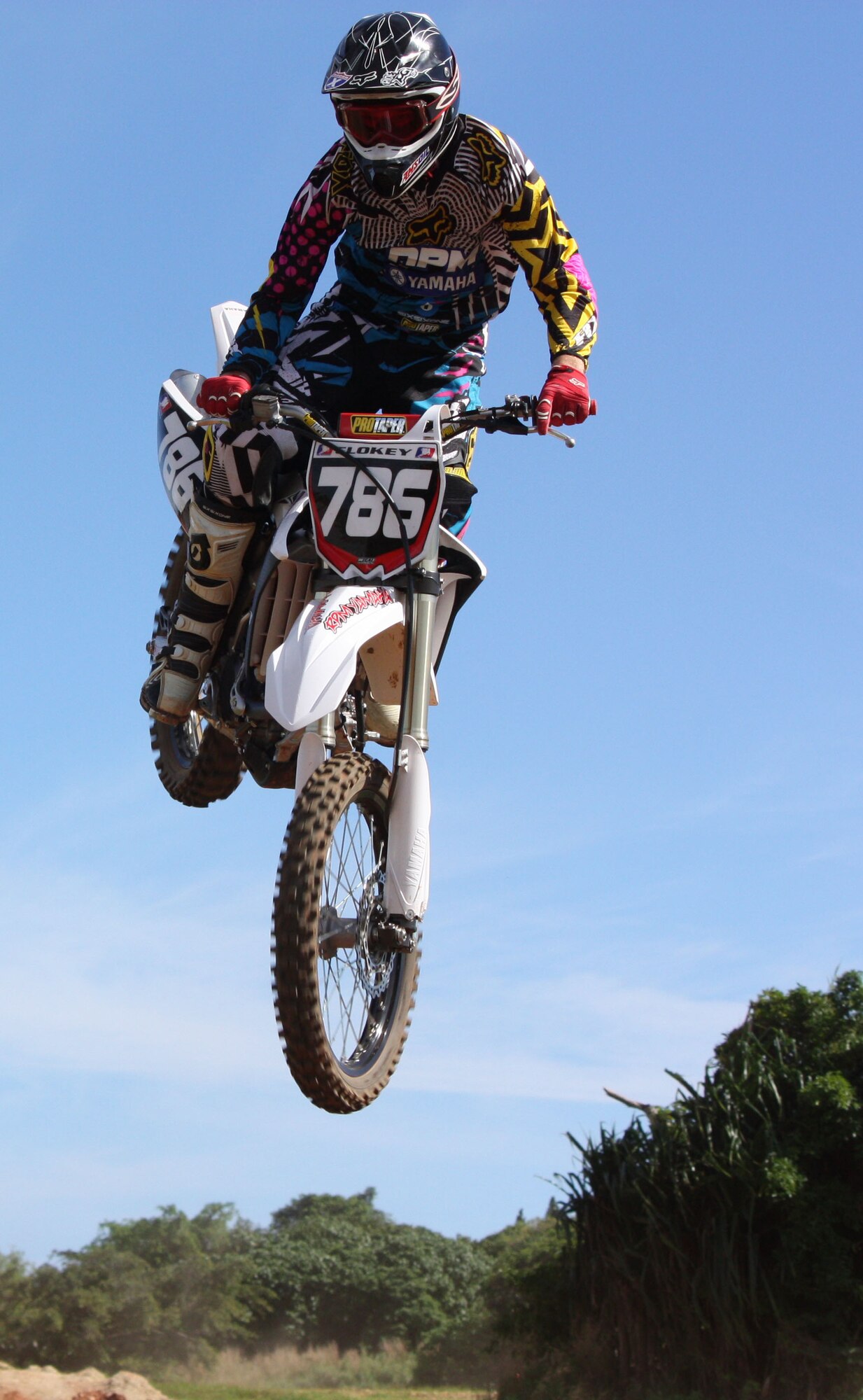 ANDERSEN AIR FORCE BASE, Guam - Senior Airman Jesse Clokey, 734th Air
Mobility Squadron, soars through the sky after a jump during the final race
of the 2009 Open-Class Motocross Championship Dec. 6. Airman Clokey took
home the championship and finished the year with 13 race wins on Guam. (Courtesy photo)