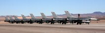 F-16s from Homestead Air Reserve Base Fla. and Carswell Joint Reserve Base, Texas., line up on the runway of Nellis Air Force Base, Nev., to partake in a series of jet-fighter exercises, Jan 26. The exercises are part of the advanced aerial combat training exercise, Red Flag. (U.S. Air Force photo/ Tech. Sgt. Bucky Parrish)