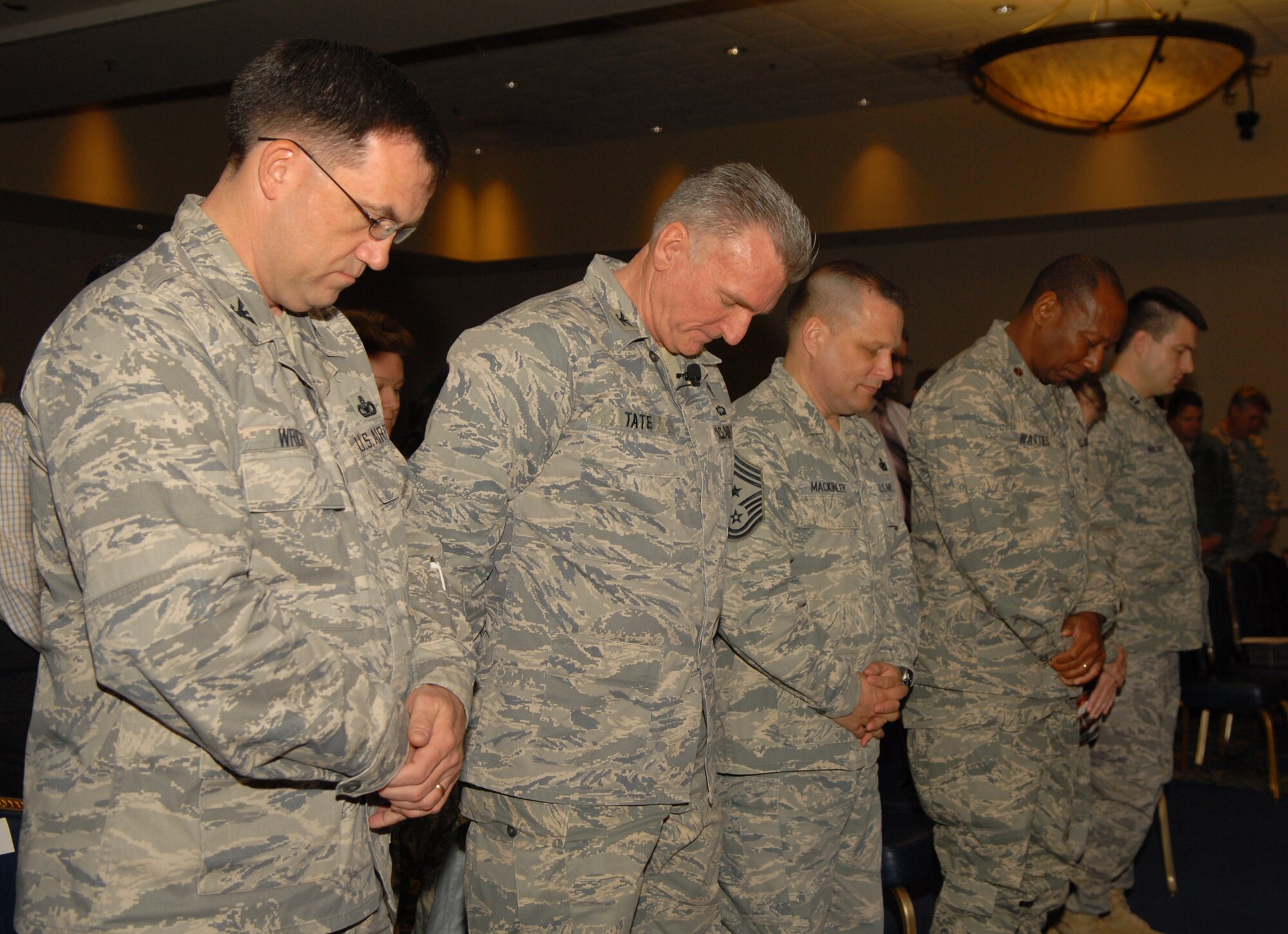 VANDENBERG AIR FORCE BASE, Calif. -- Members of Team V come together to pray during the National Prayer Breakfast at the Pacific Coast Club here Tuesday, Jan. 25, 2010. The breakfast is held annually to unite multiple religions in prayer for the U.S.(U.S. Air Force photo/Airman 1st Class Kerelin Molina)